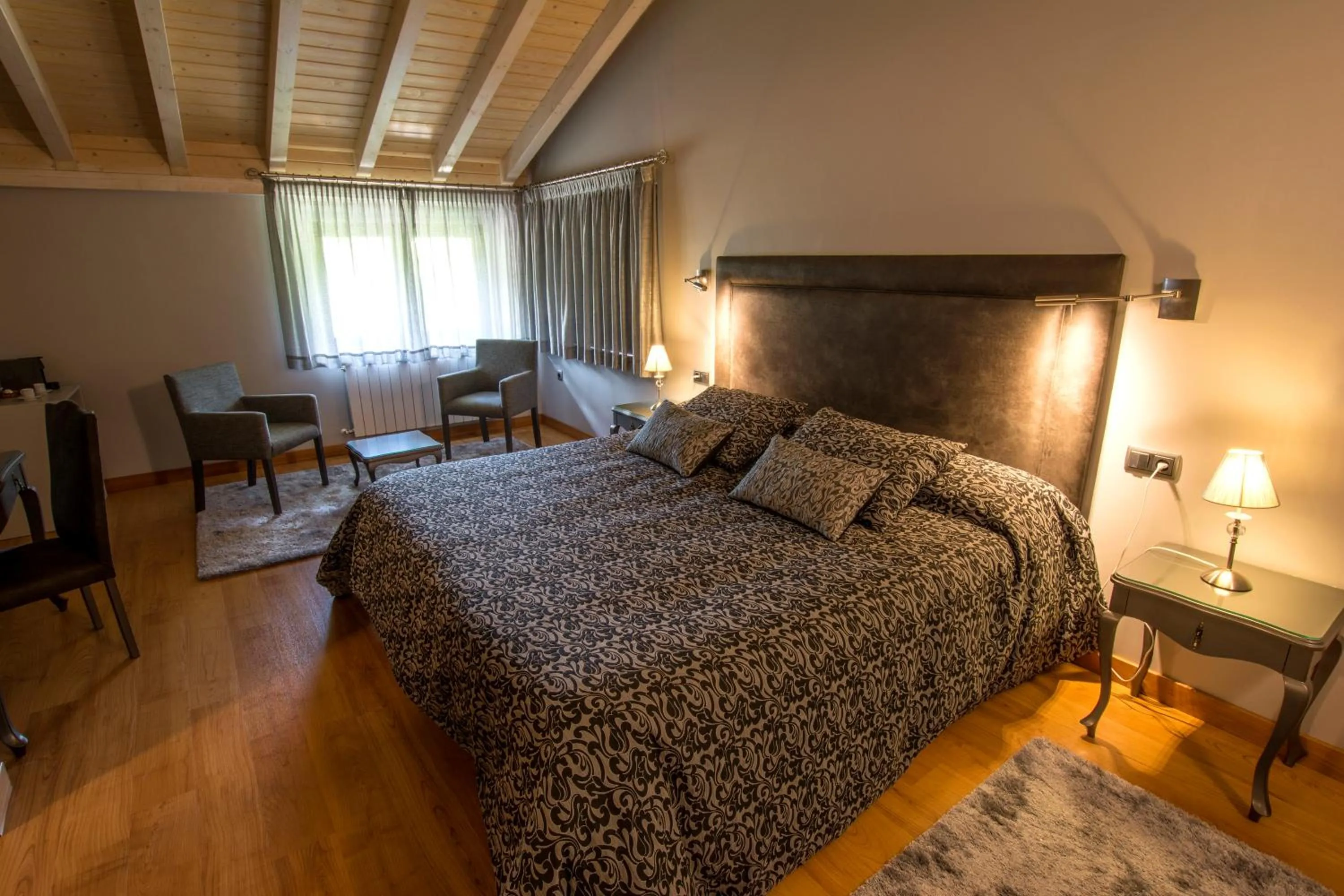 Bed in Picos de Europa Suites and Rooms