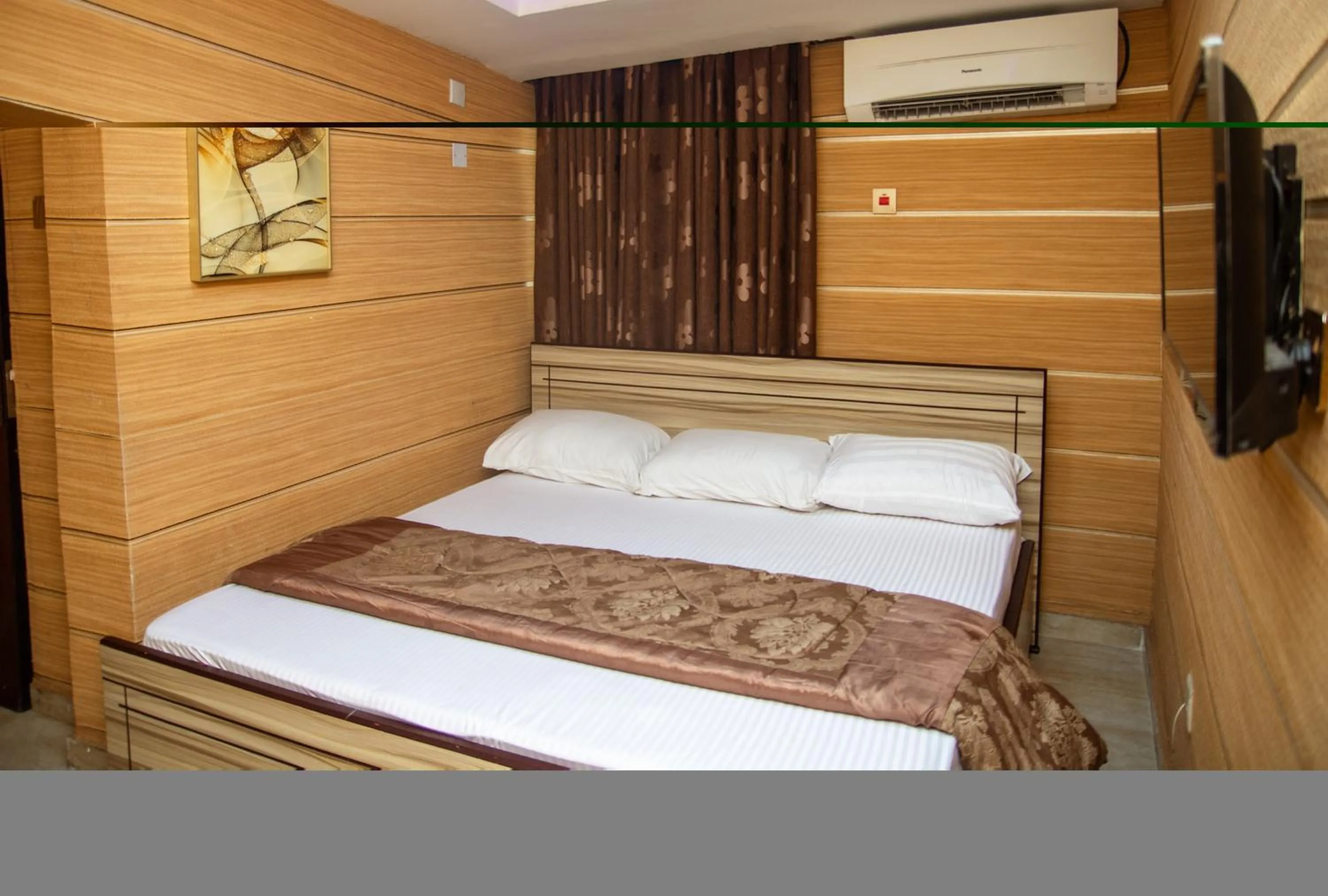 Bed in Haffy Executive Hotels and Suite