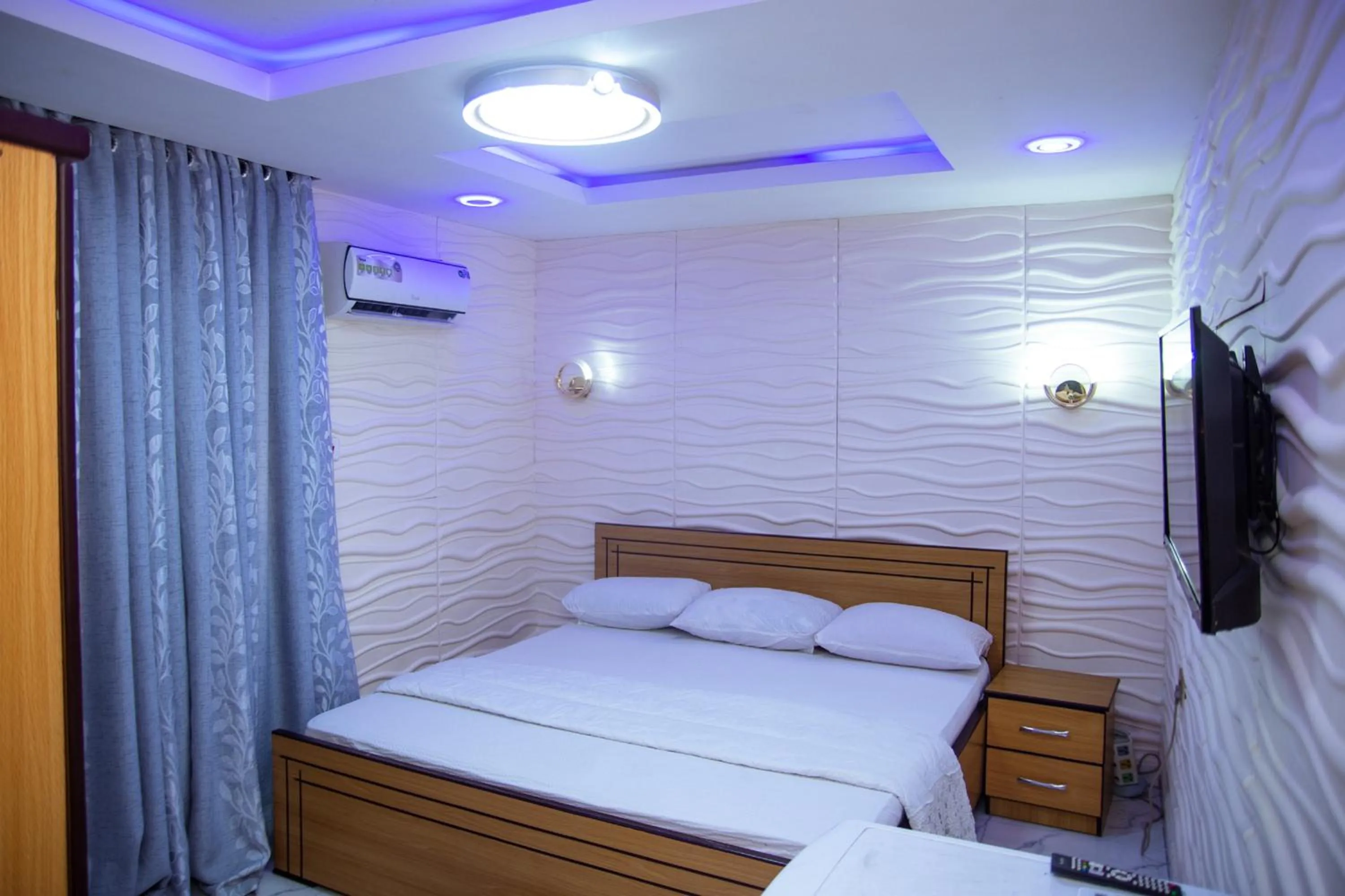 Bed in Haffy Executive Hotels and Suite