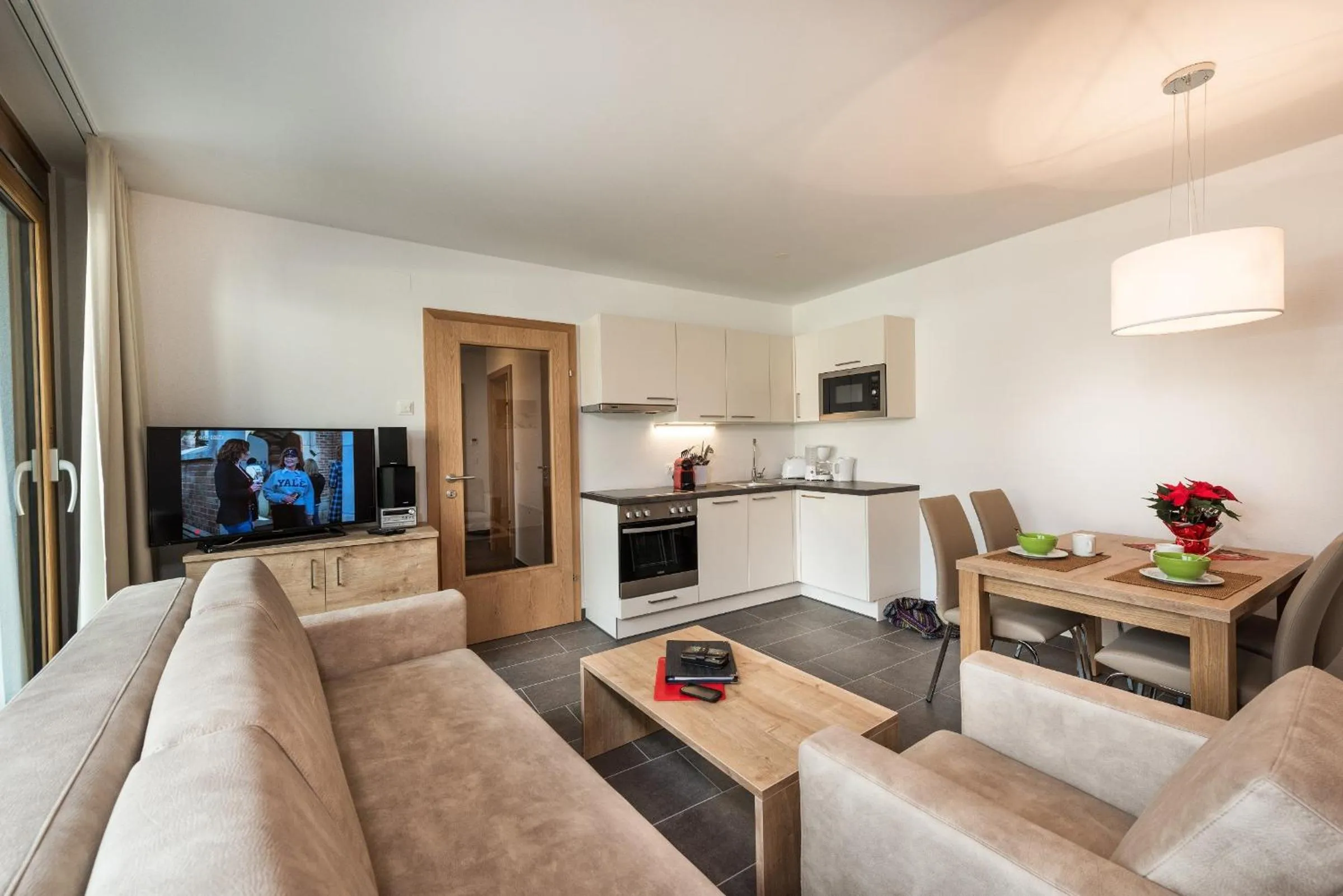 Kitchen or kitchenette in AlpenParks Hotel & Apartment Central Zell am See