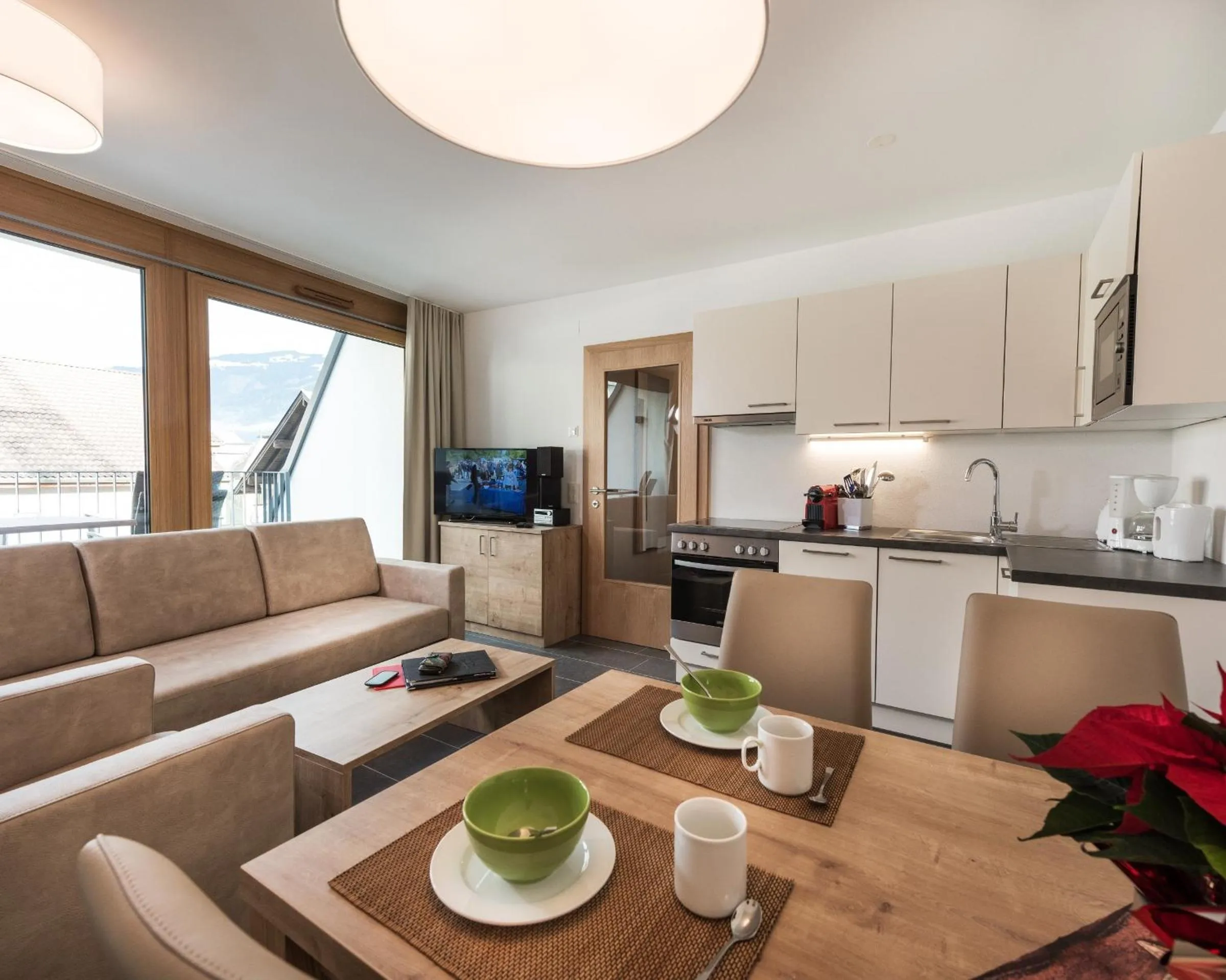 Kitchen or kitchenette in AlpenParks Hotel & Apartment Central Zell am See