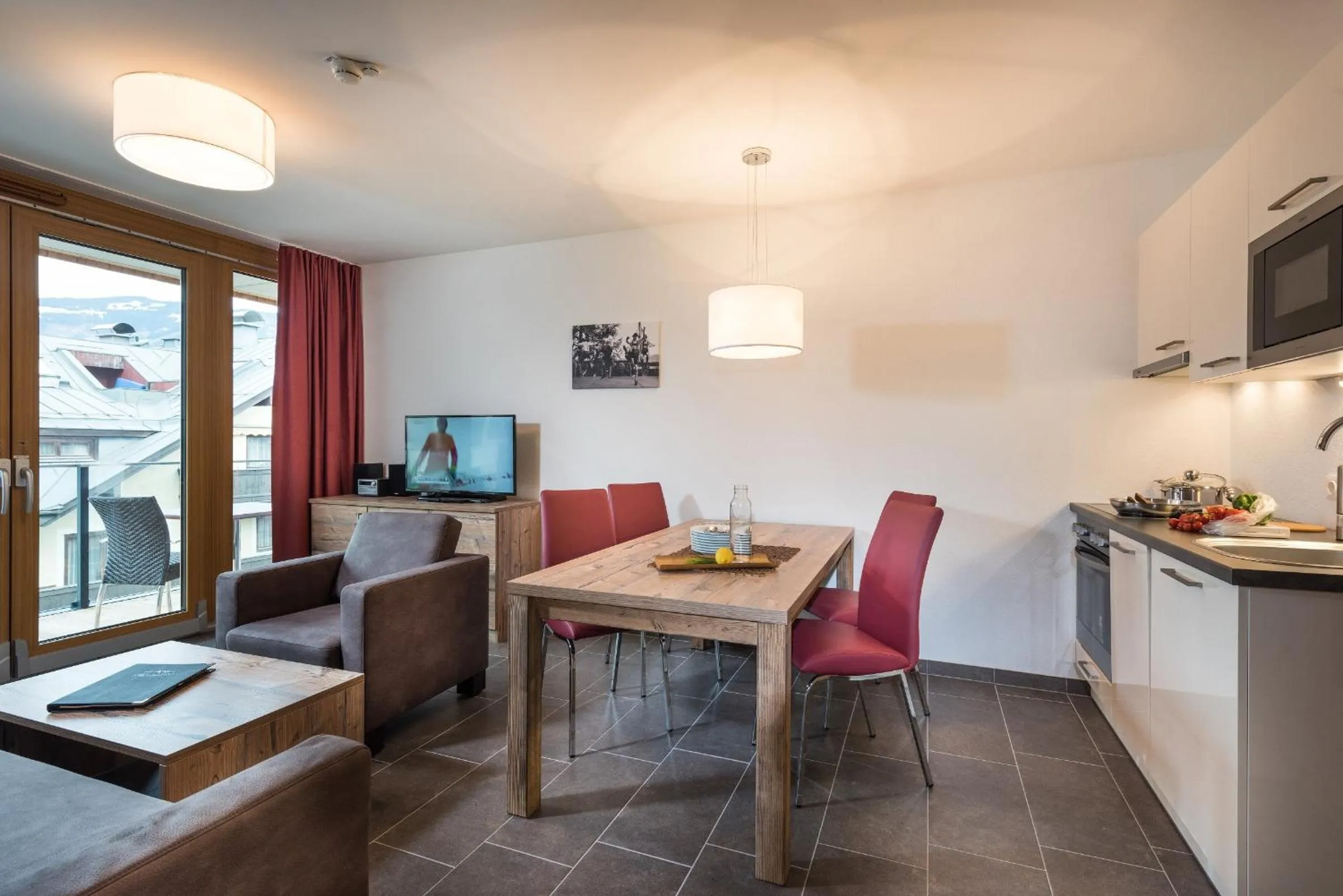 Kitchen or kitchenette in AlpenParks Hotel & Apartment Central Zell am See