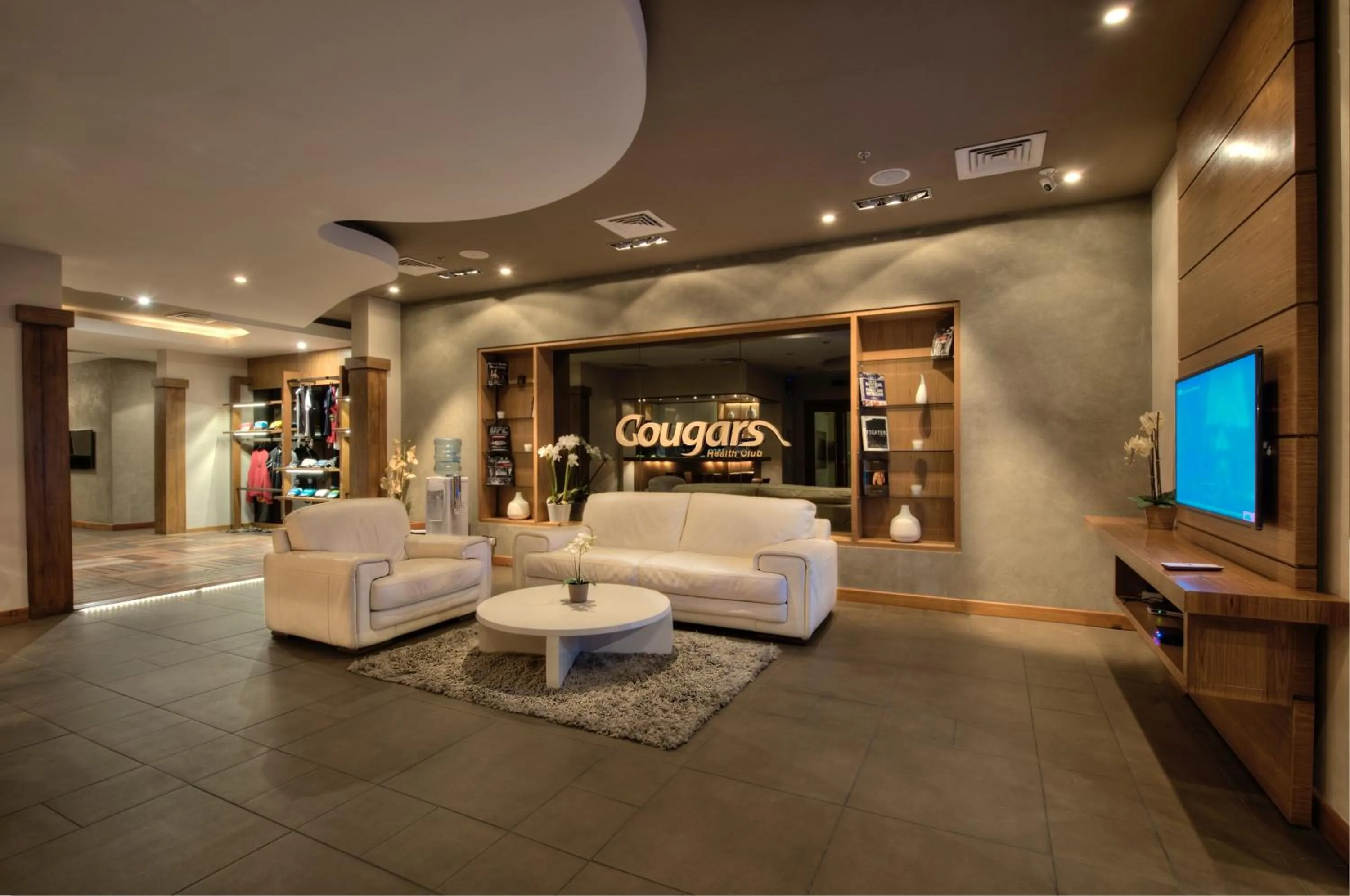 Fitness centre/facilities, Lobby/Reception in Al Rawasi Hotel Suites