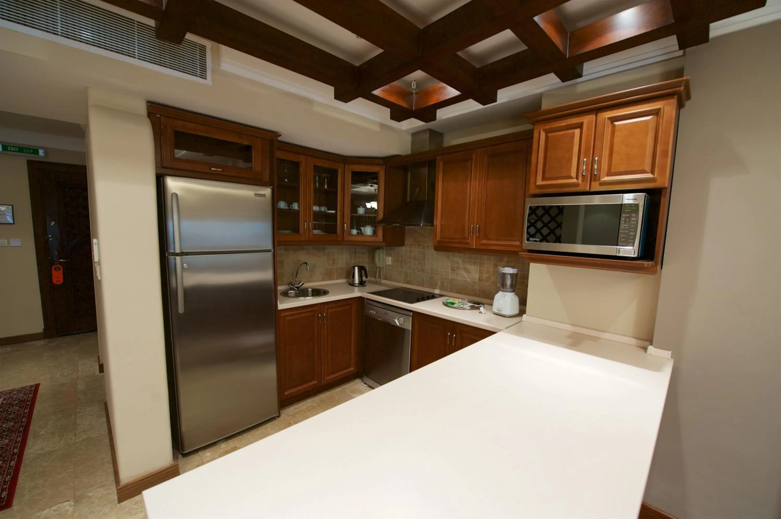Kitchen or kitchenette, Kitchen/Kitchenette in Al Rawasi Hotel Suites