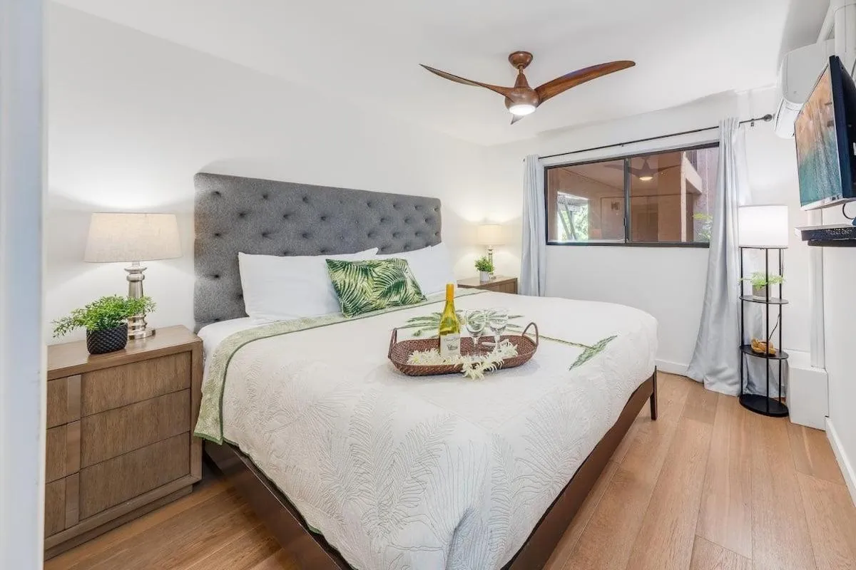 Bed in Lauloa 105 · LOA 105 2BD OceanFront Getaway w AC Pool