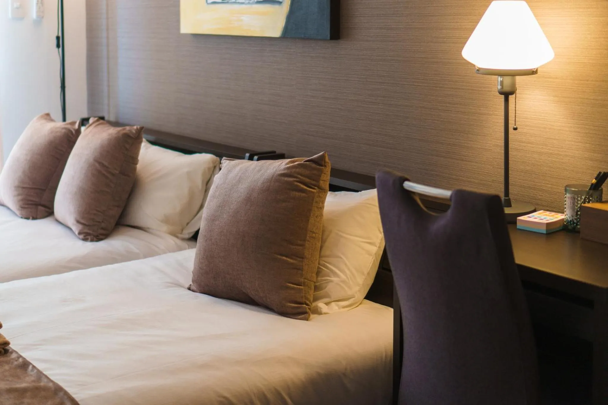 Bed in KINTARO Hotel Okinawa Naha