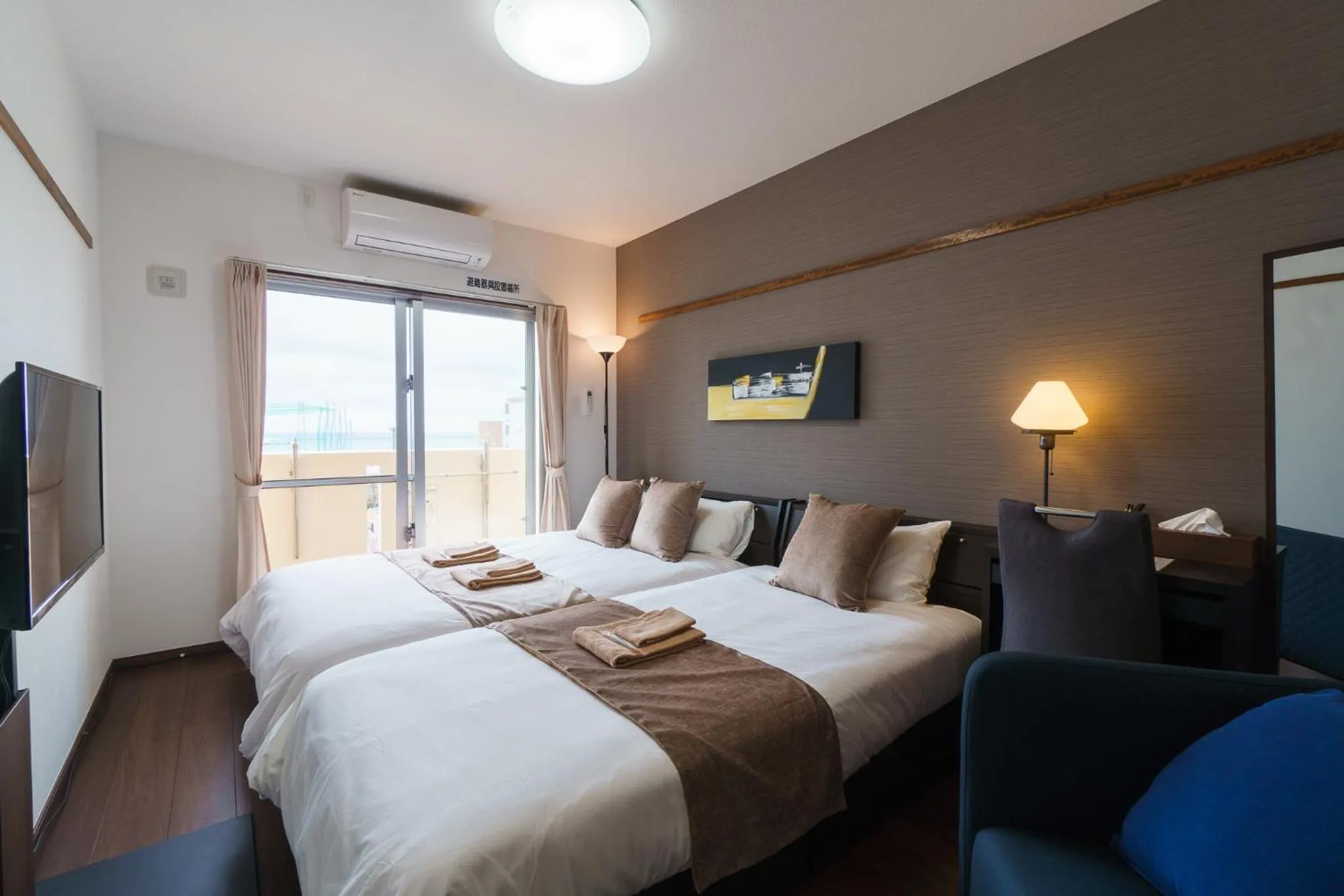 Bed in KINTARO Hotel Okinawa Naha