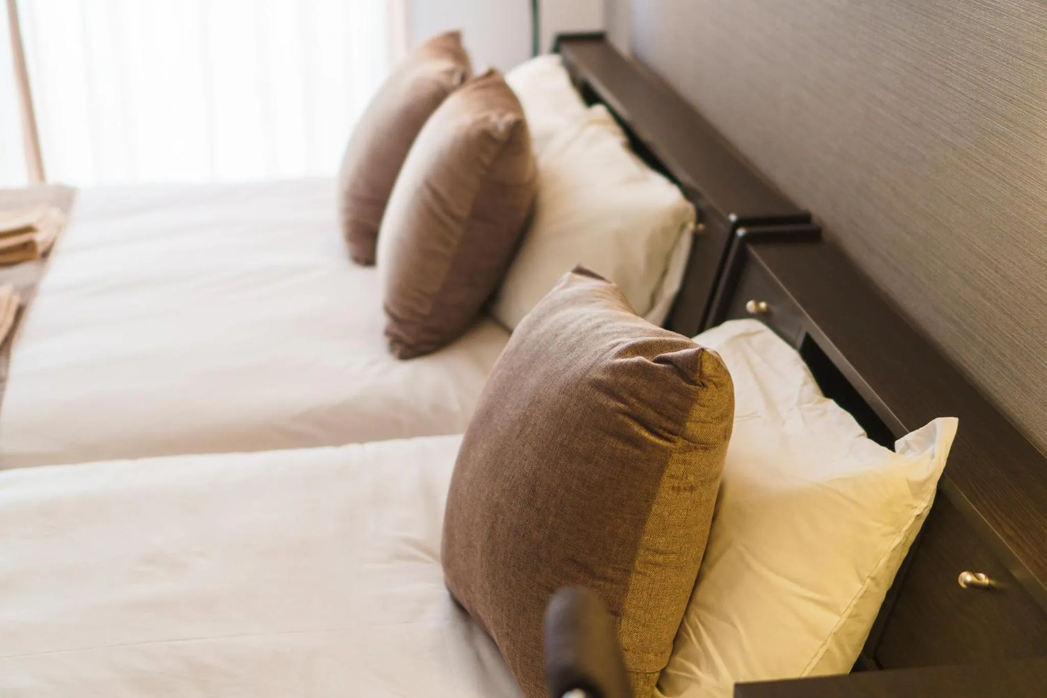 Bed in KINTARO Hotel Okinawa Naha