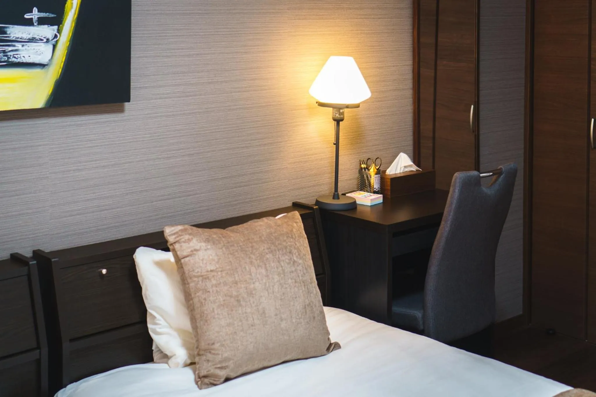 Bed in KINTARO Hotel Okinawa Naha