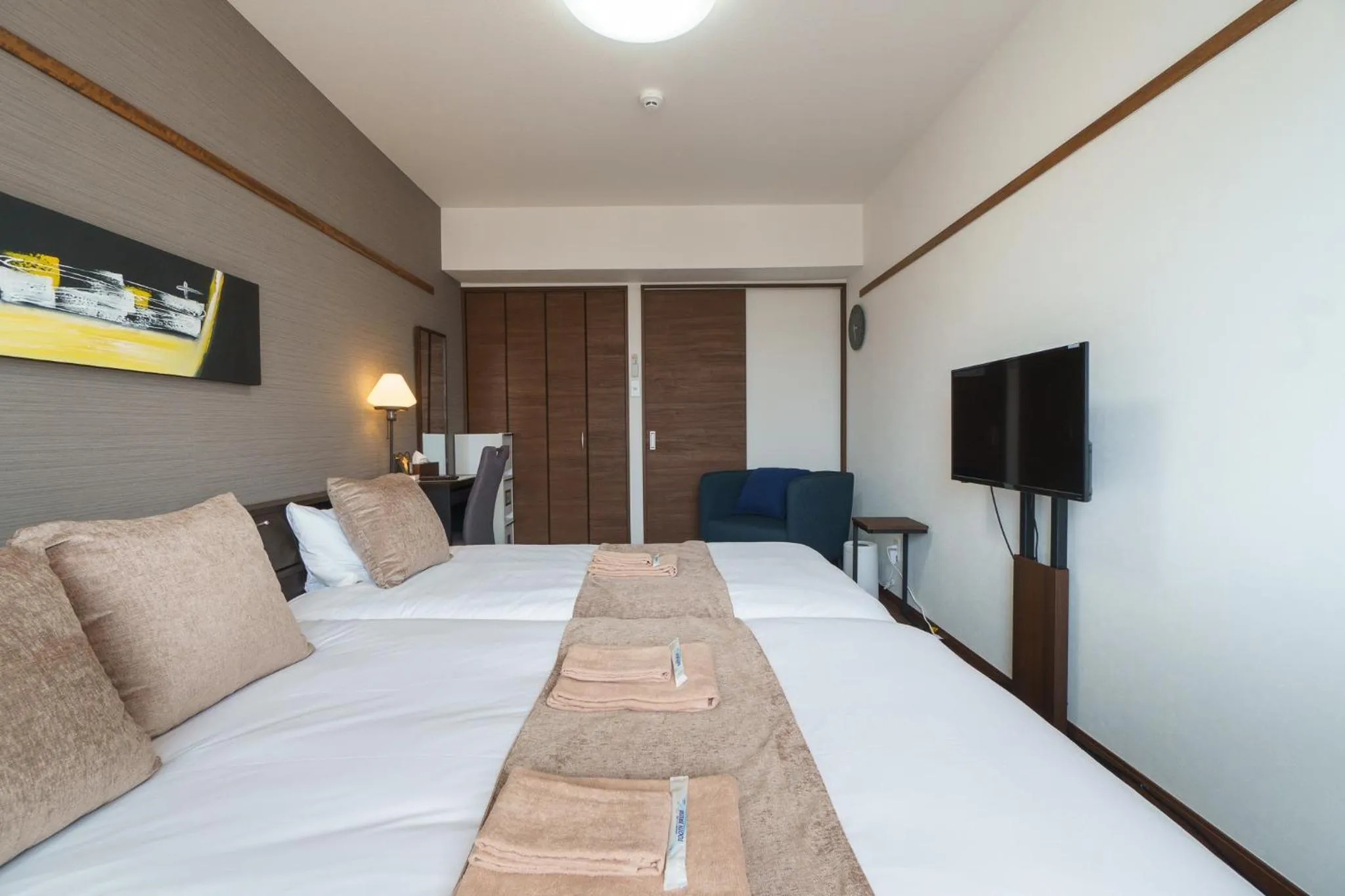 Bed in KINTARO Hotel Okinawa Naha