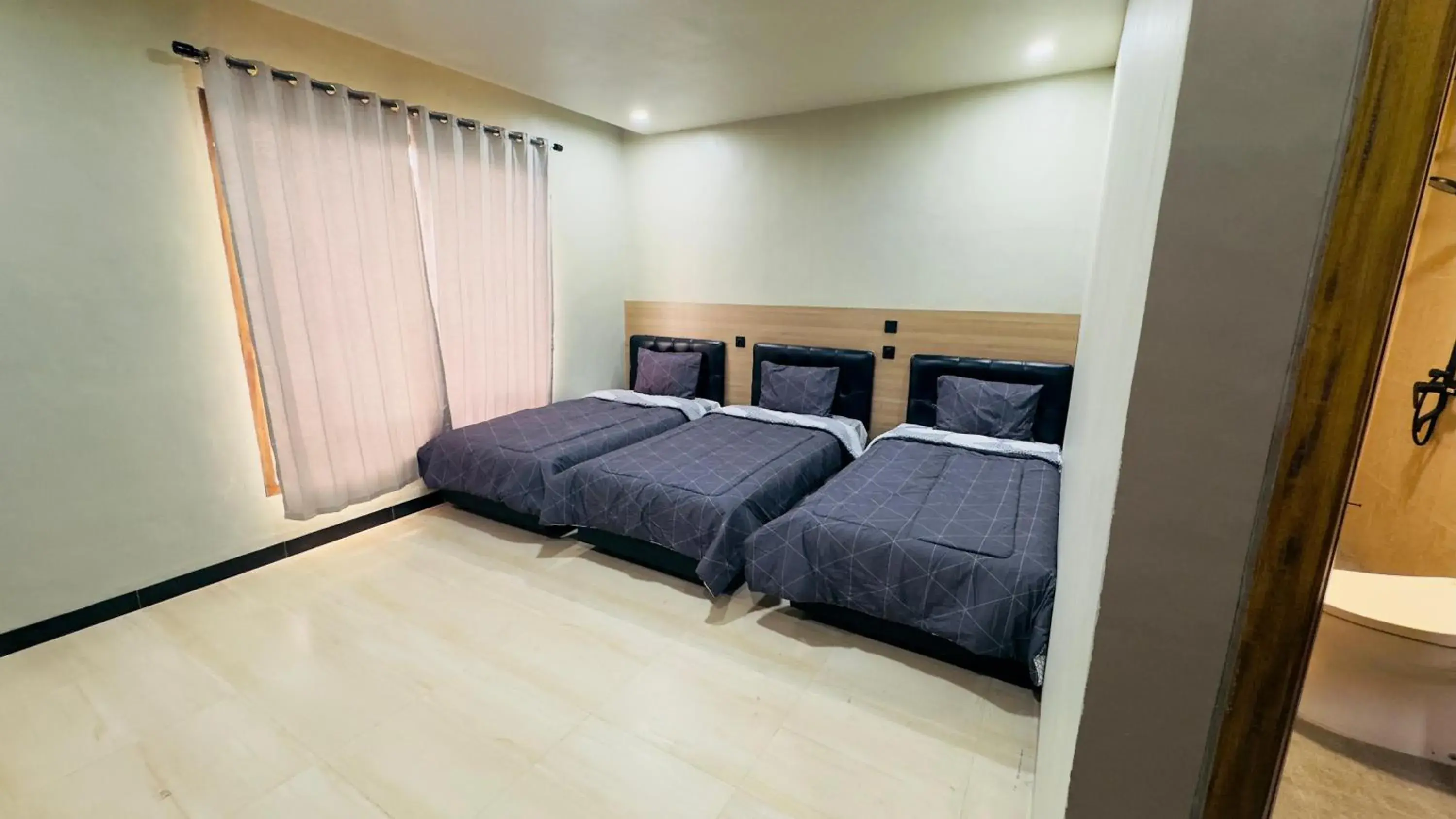 Triple Room with Terrace in Sky View Bromo Guest House Triple Room with Terrace in Sky View Bromo Guest House