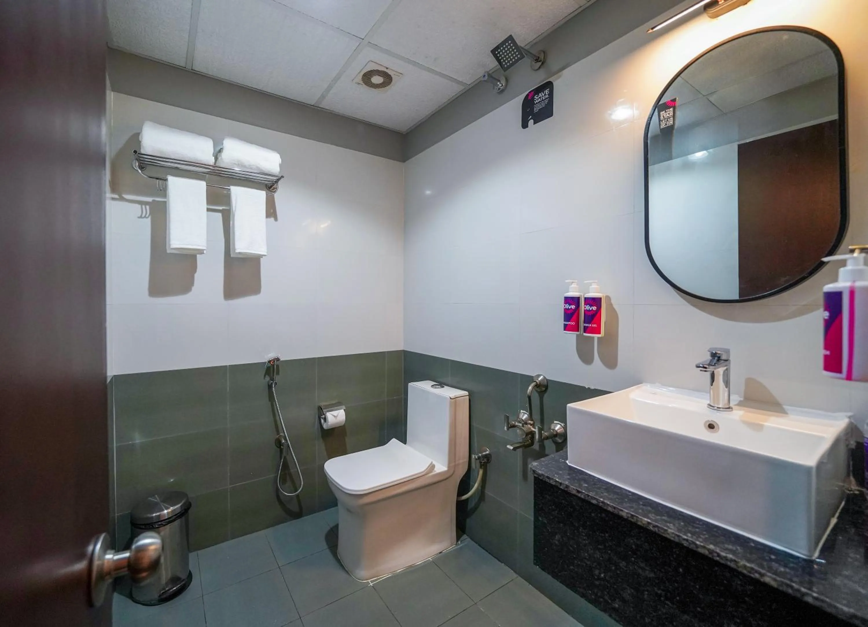 Toilet in Olive Hotel Hosa Road Metro by Embassy Group