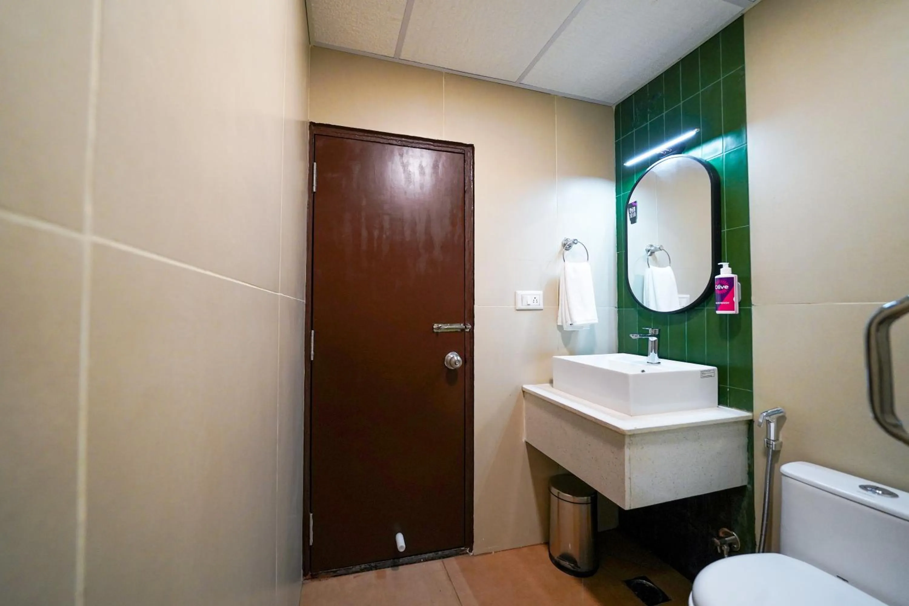 Toilet in Olive Hotel Hosa Road Metro by Embassy Group