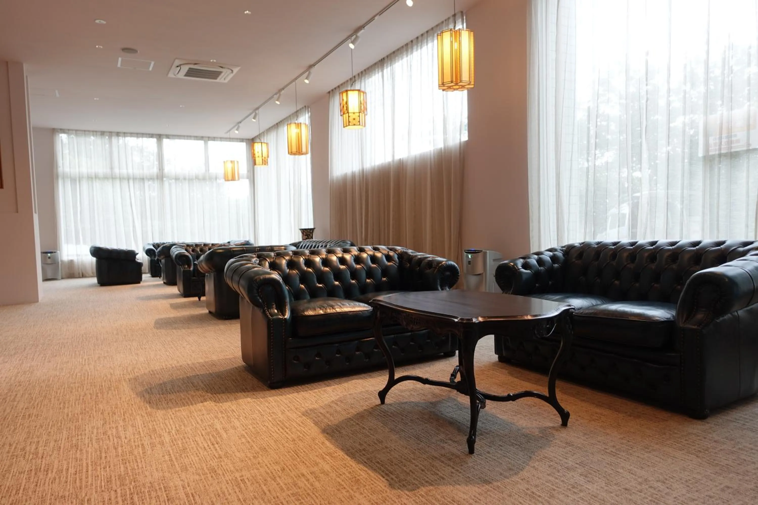 Communal lounge/ TV room in Resort Hotel RAKI House Nasu