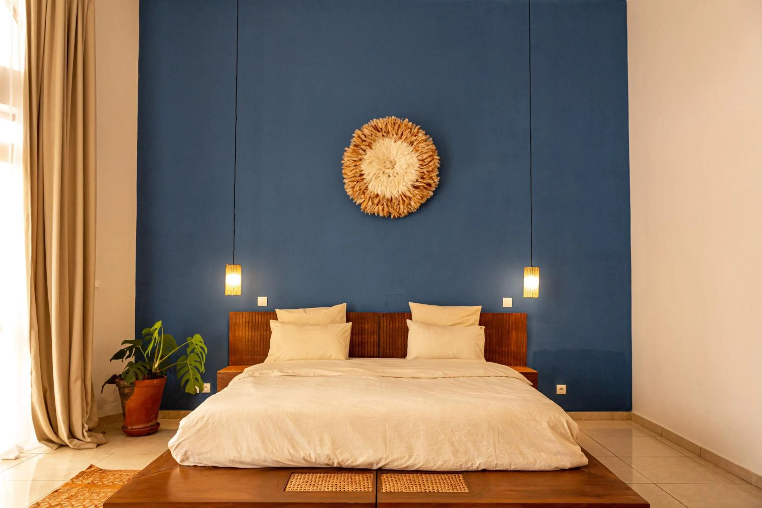 Bed in Tamarin Hôtel Cotonou