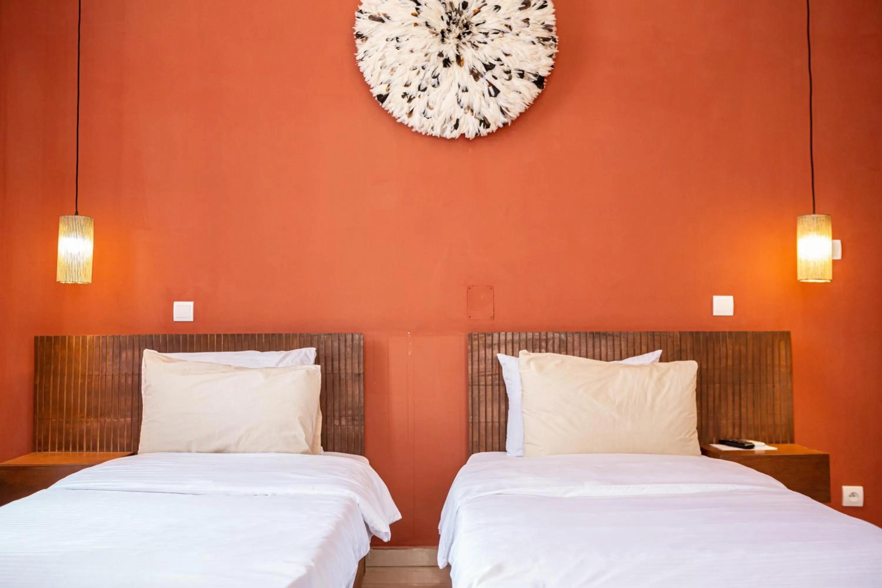 Bed in Tamarin Hôtel Cotonou