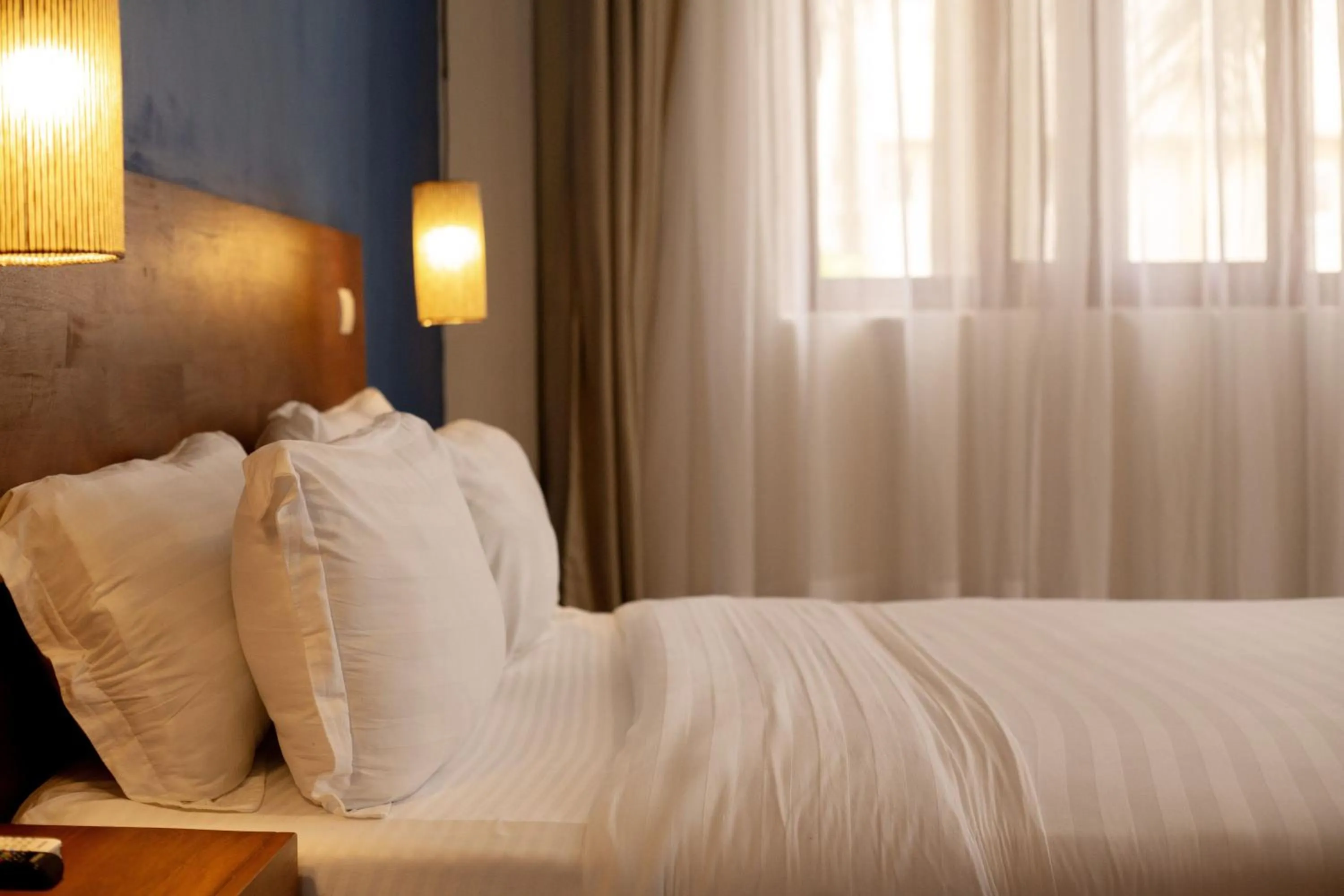 Bed in Tamarin Hôtel Cotonou