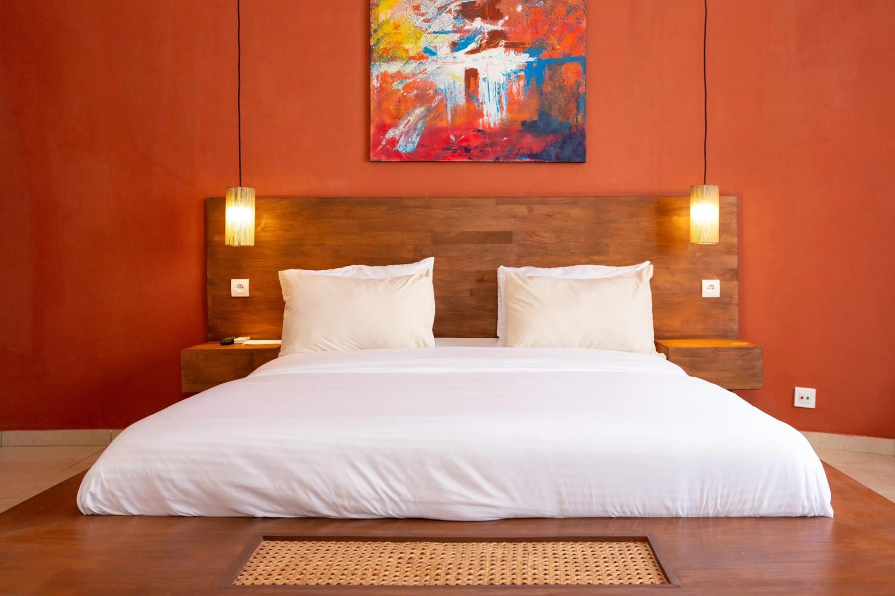 Bed in Tamarin Hôtel Cotonou