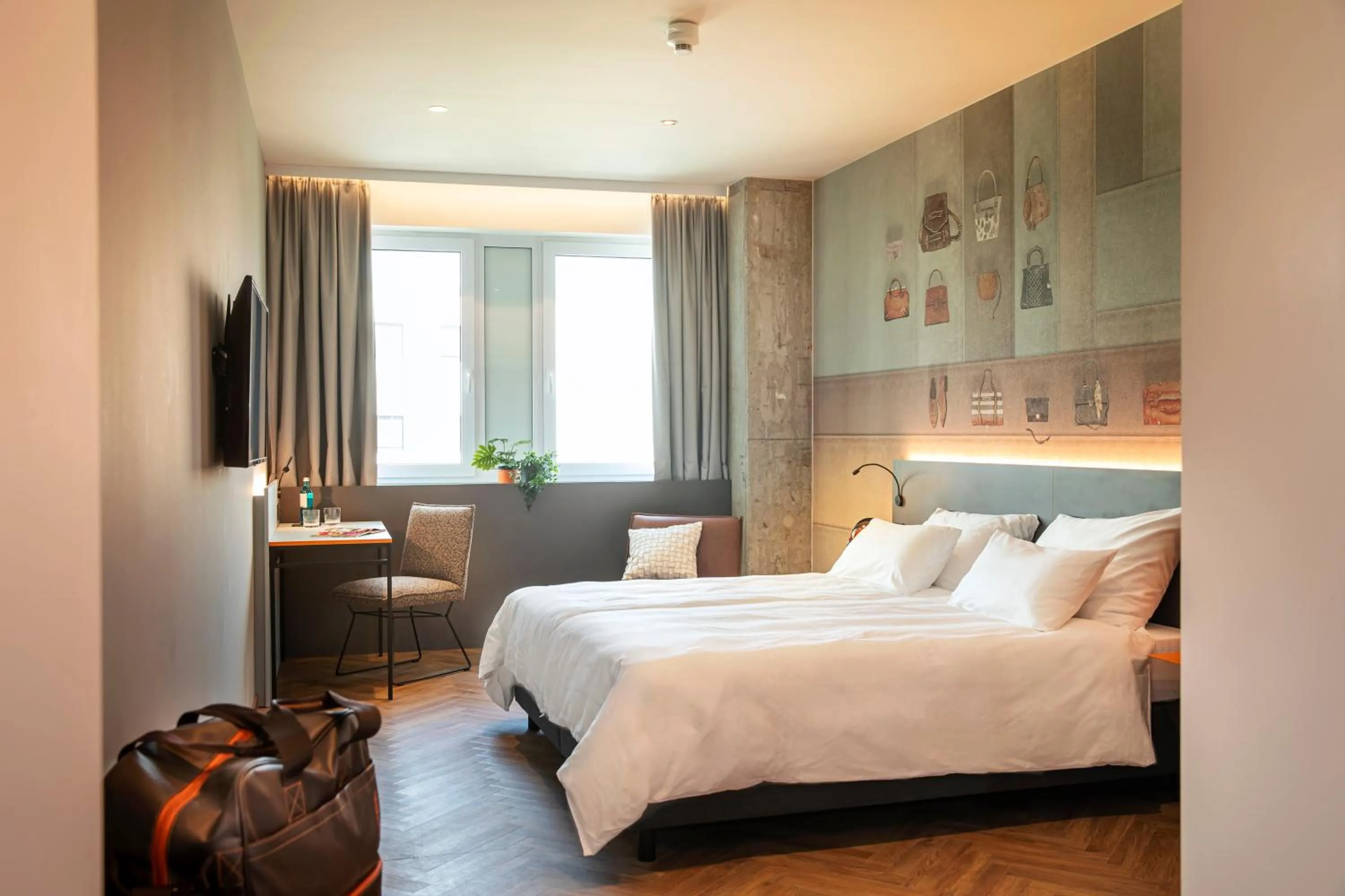Photo of the whole room, Bed in LOGINN Hotel Offenbach
