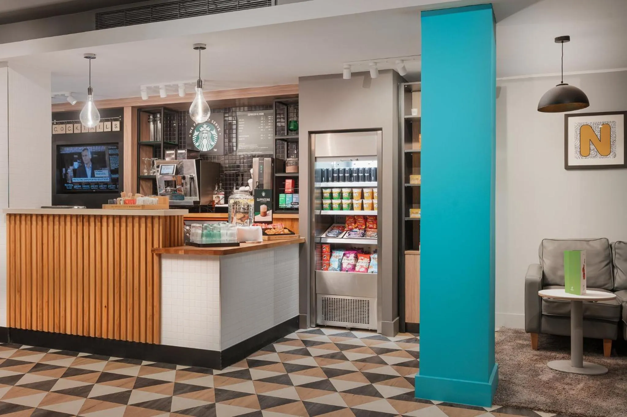 Lounge or bar in Holiday Inn Northampton by IHG