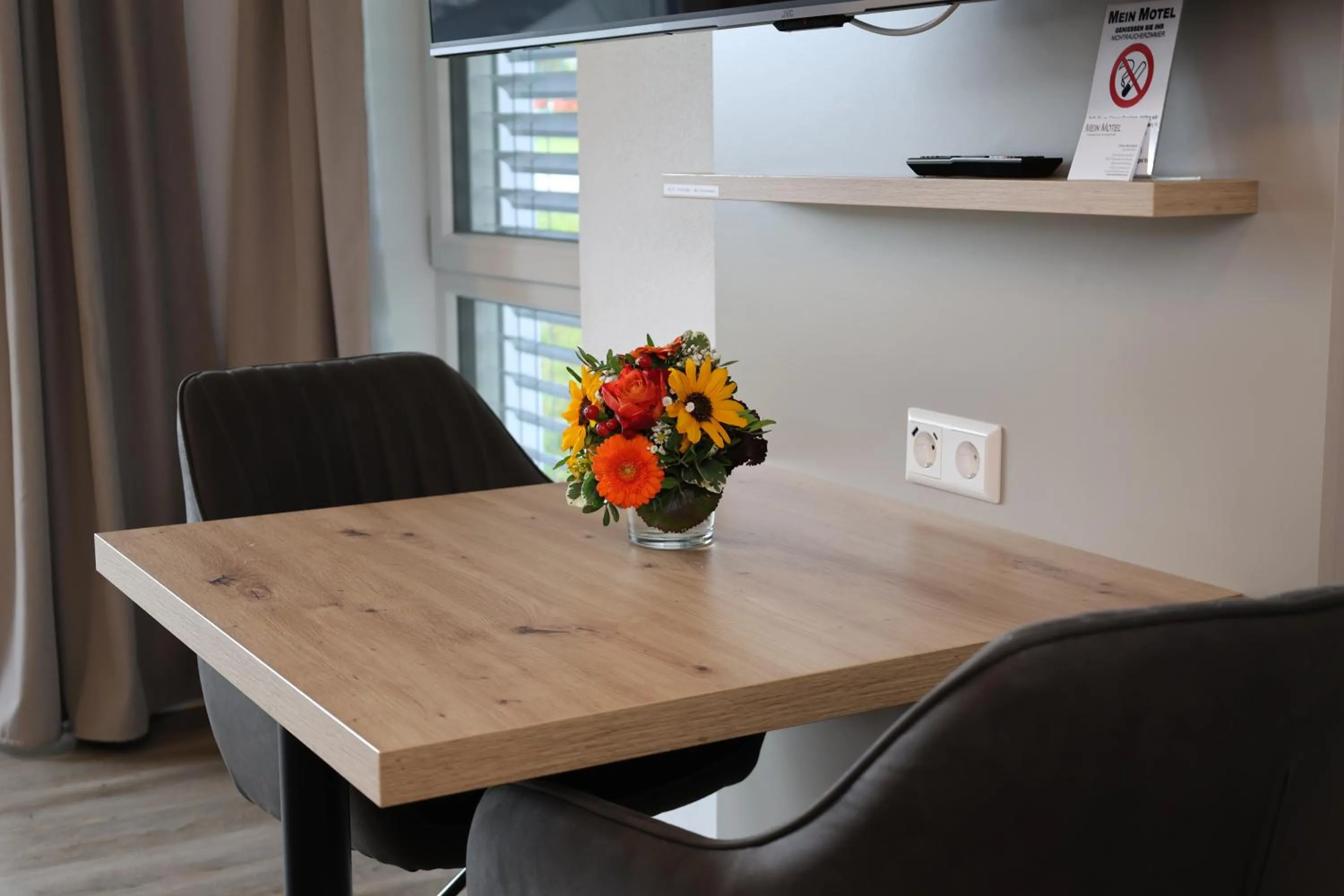 Seating area in MEIN MOTEL - Self Check-in