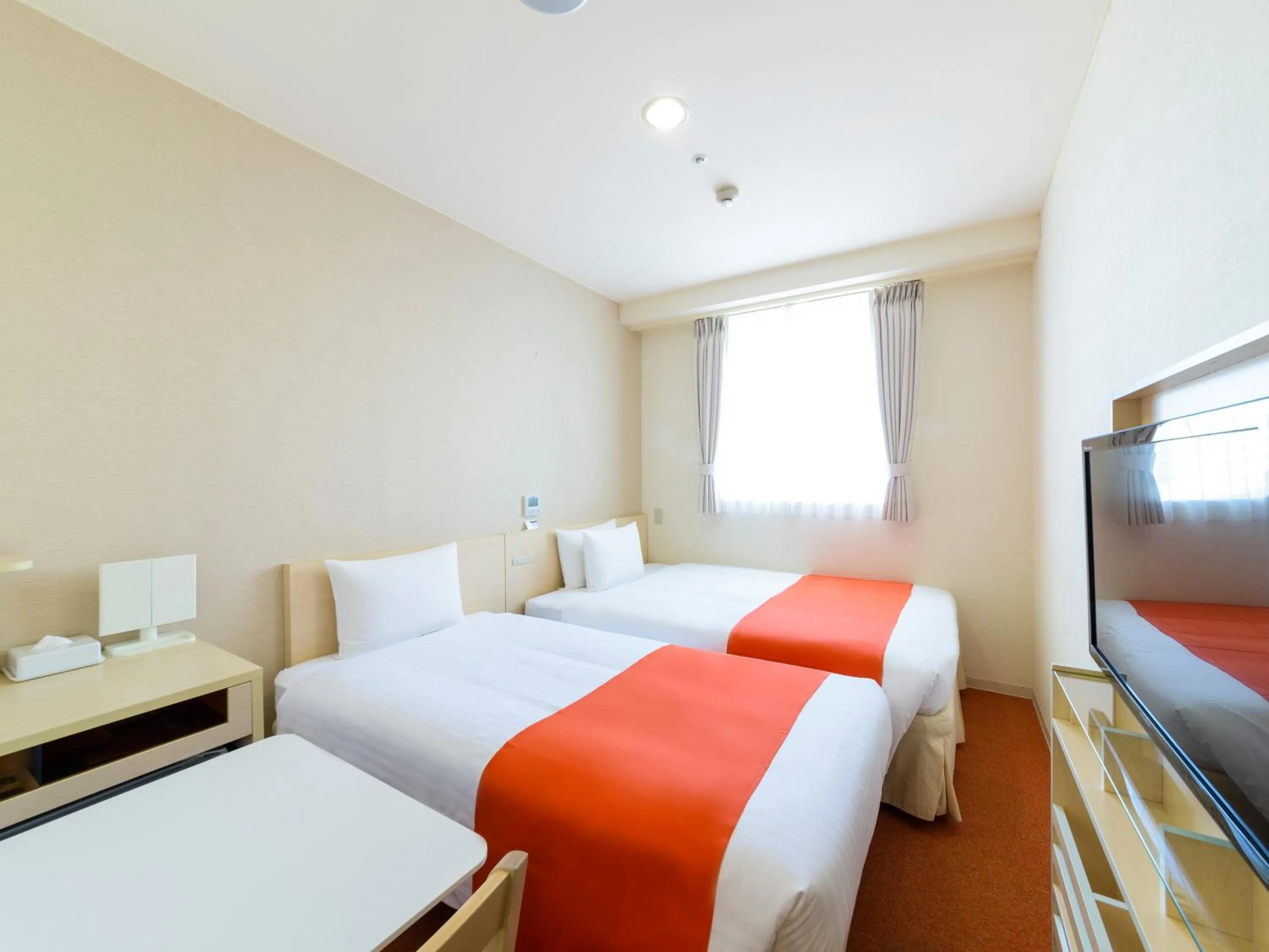 Photo of the whole room, Bed in Hotel Abest Naha Kokusai Street