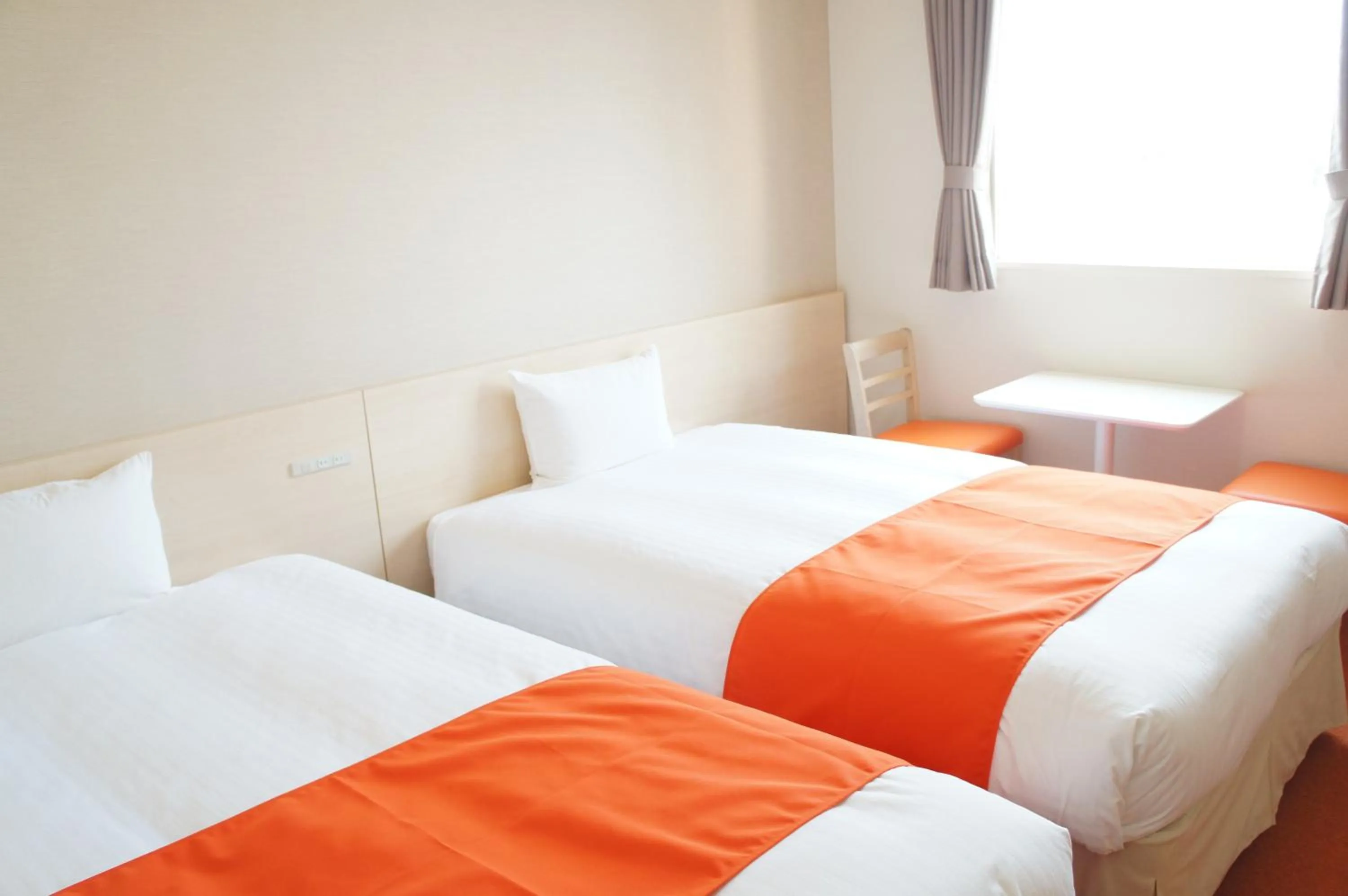 Bed in Hotel Abest Naha Kokusai Street