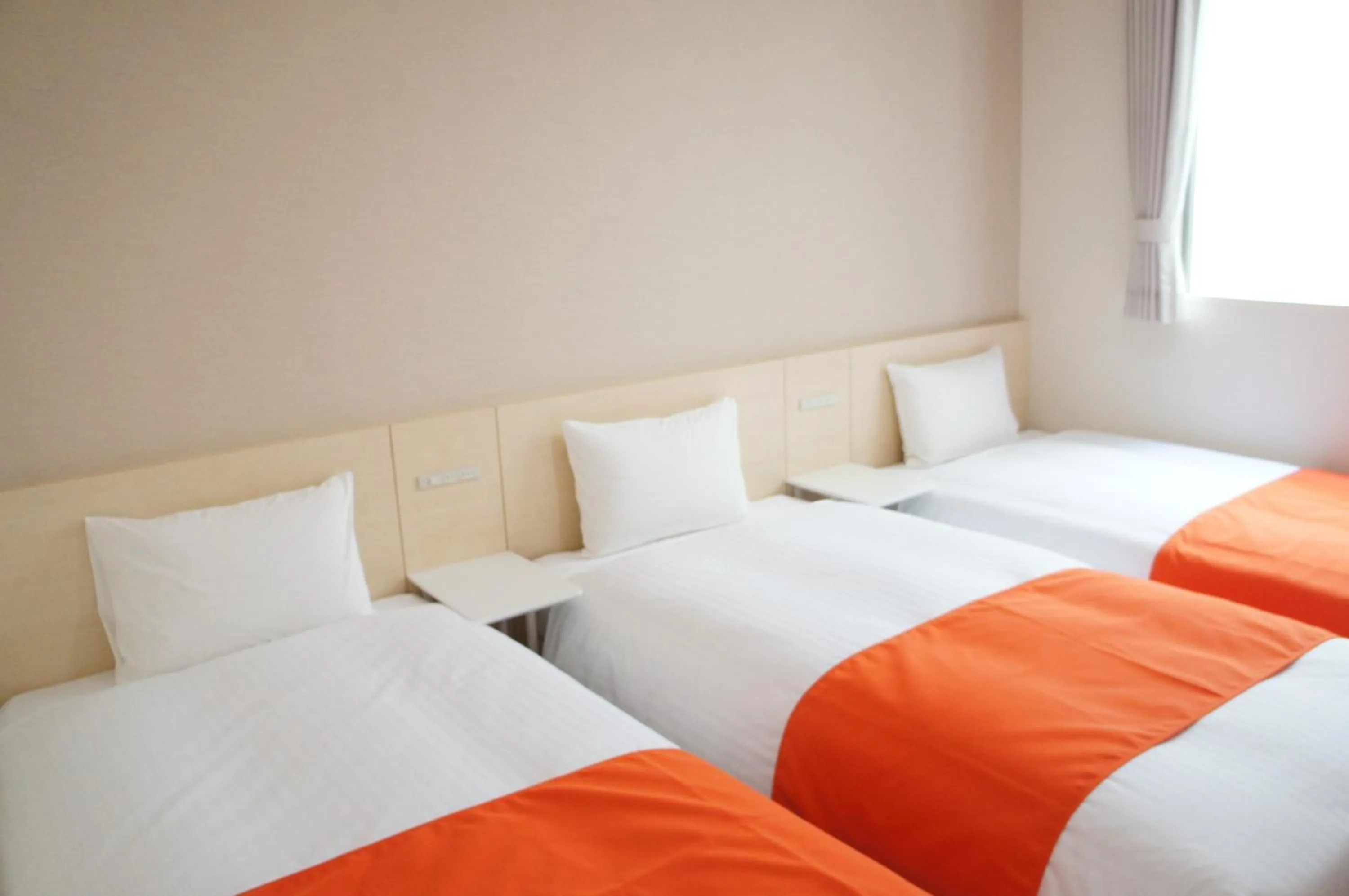 Bed in Hotel Abest Naha Kokusai Street