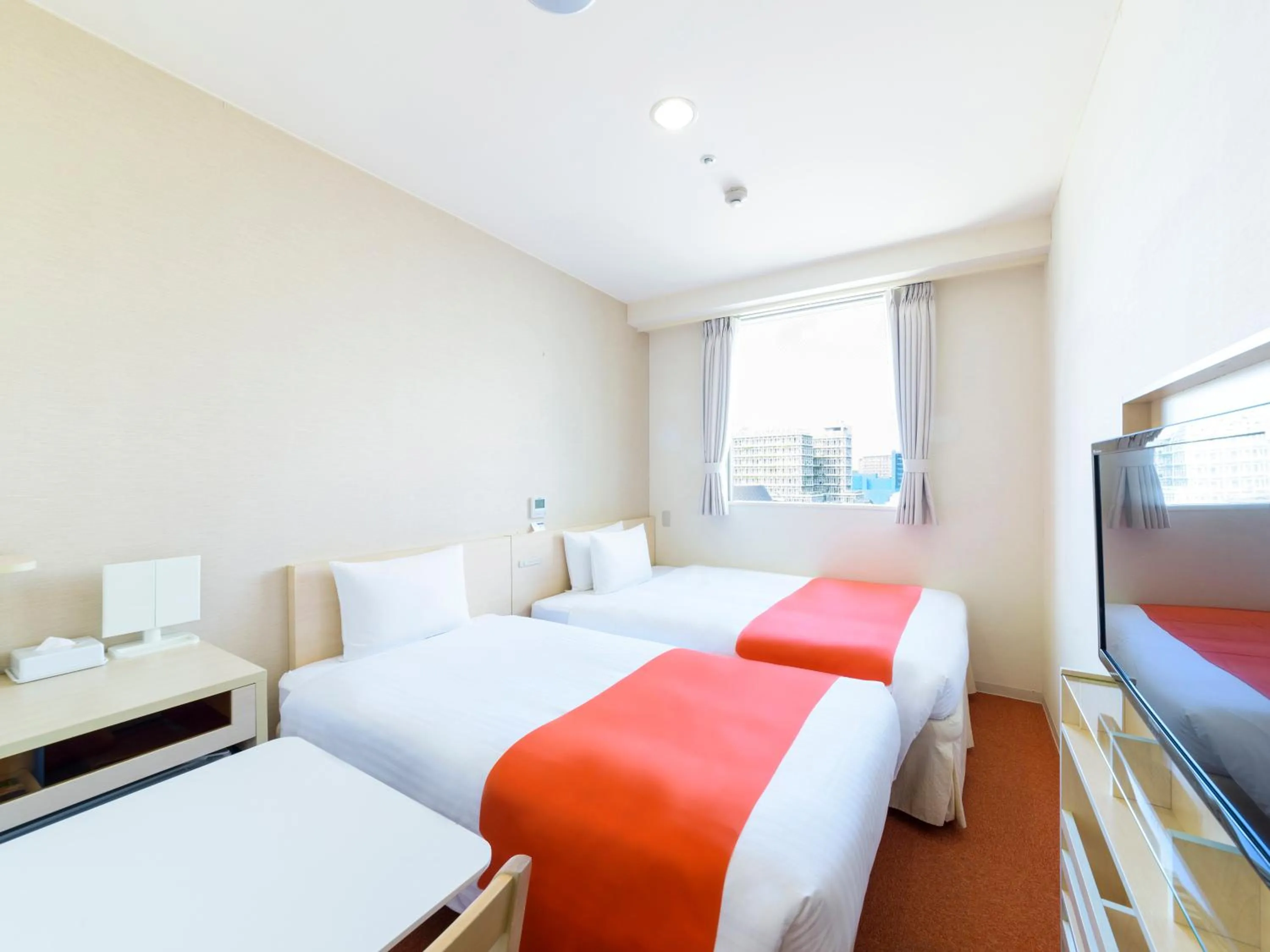 Photo of the whole room, Bed in Hotel Abest Naha Kokusai Street