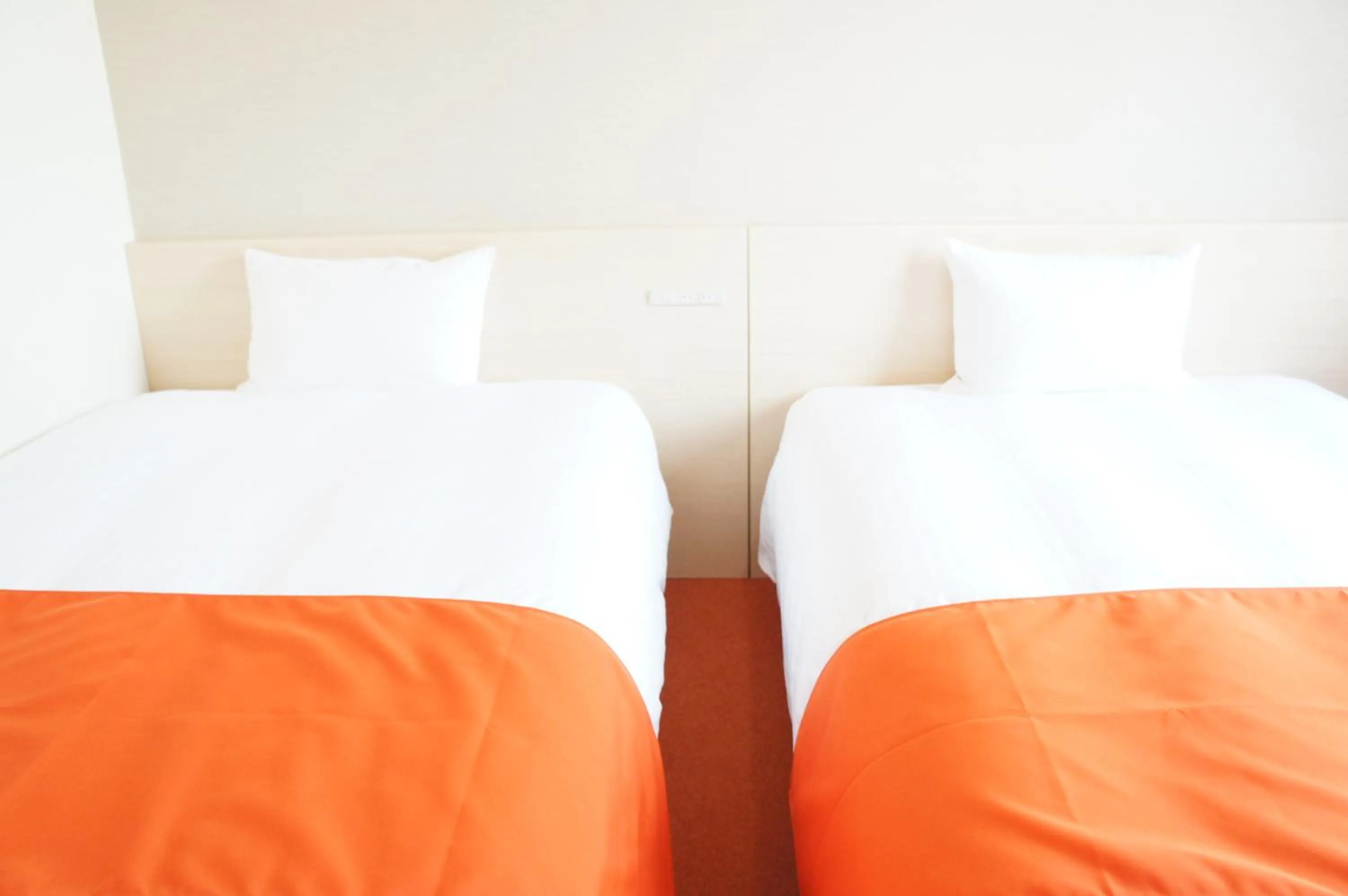 Bed in Hotel Abest Naha Kokusai Street