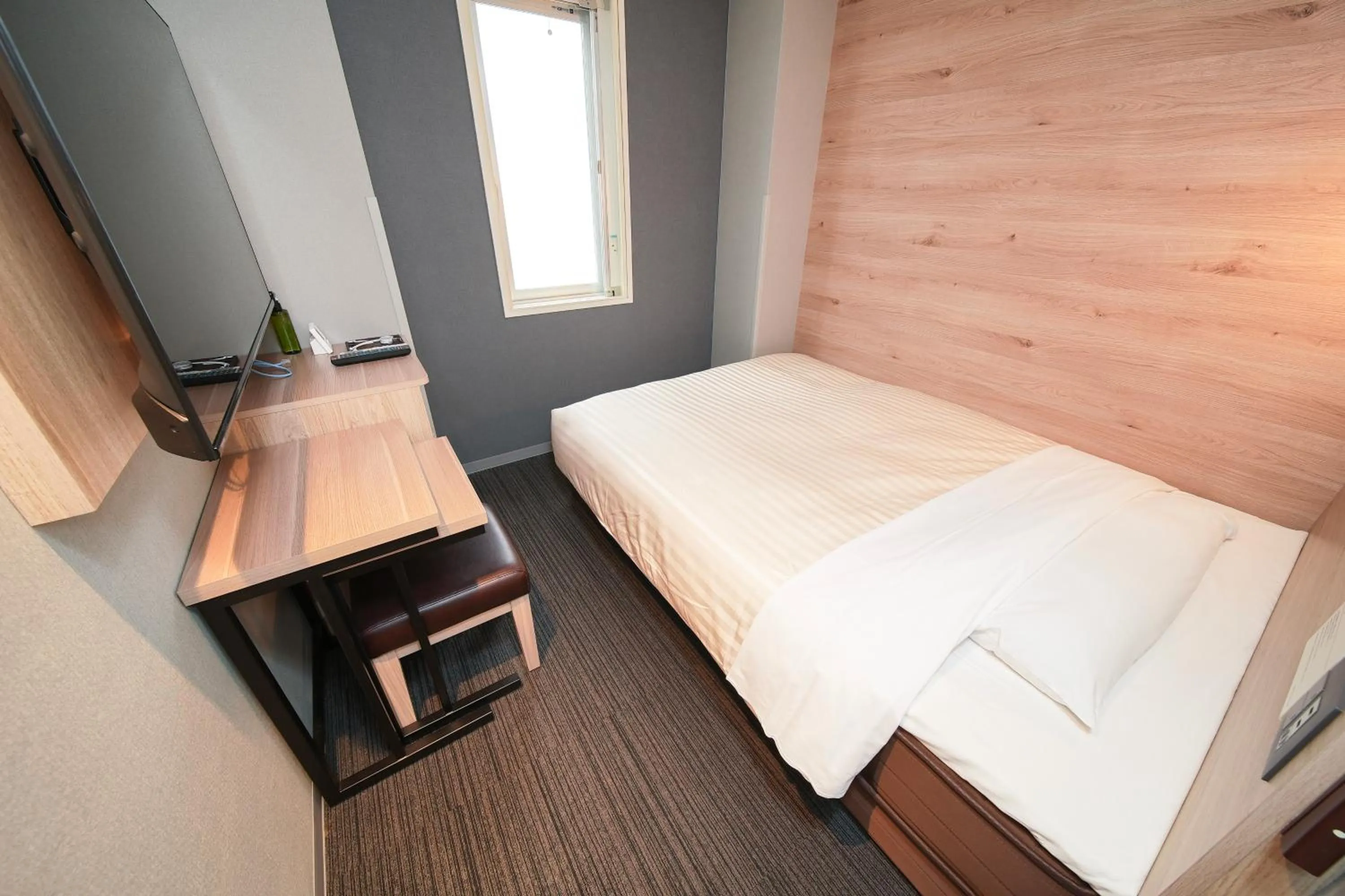 Bed in Super Hotel Utsunomiya