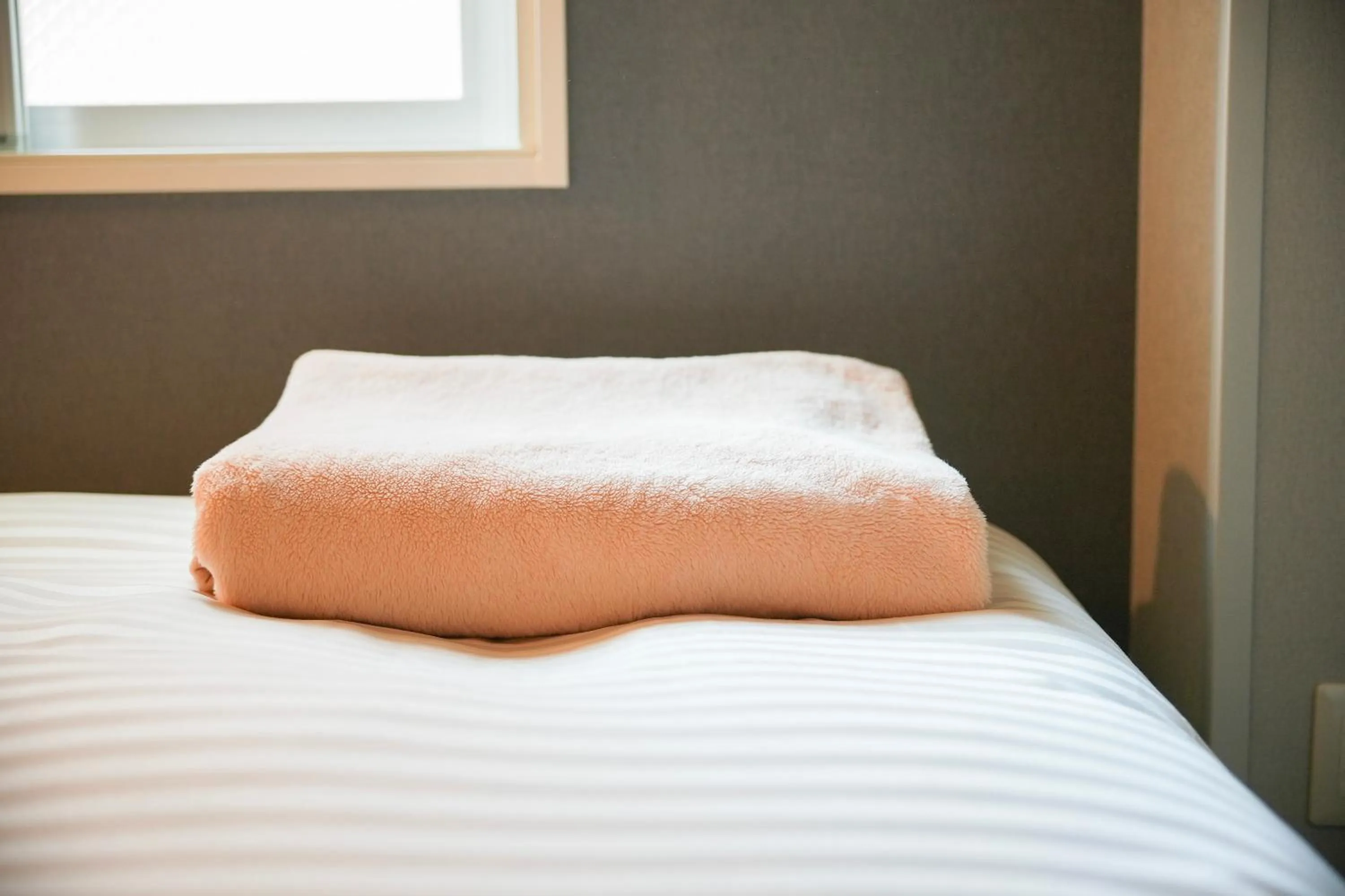 Bed in Super Hotel Utsunomiya