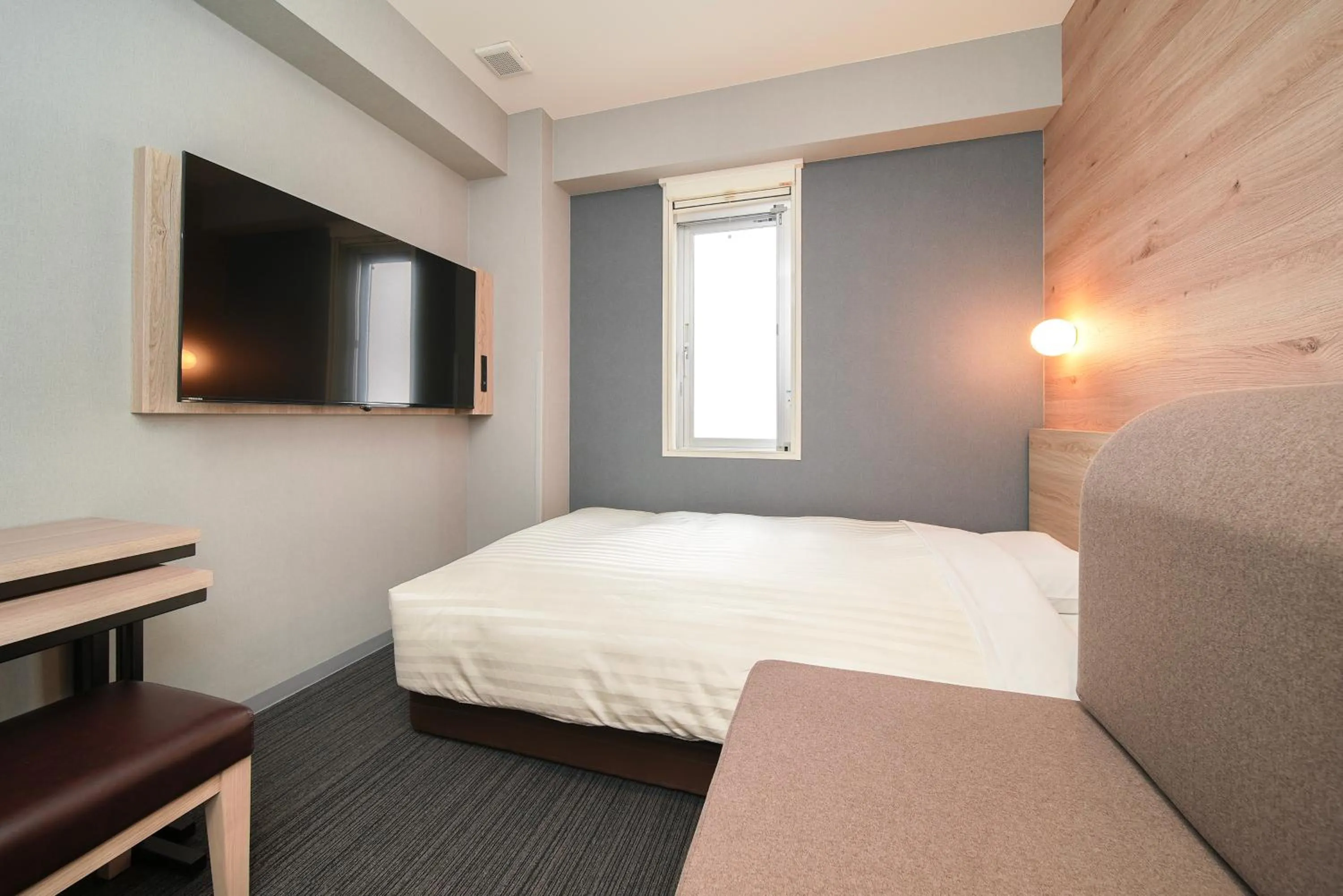 Bed in Super Hotel Utsunomiya