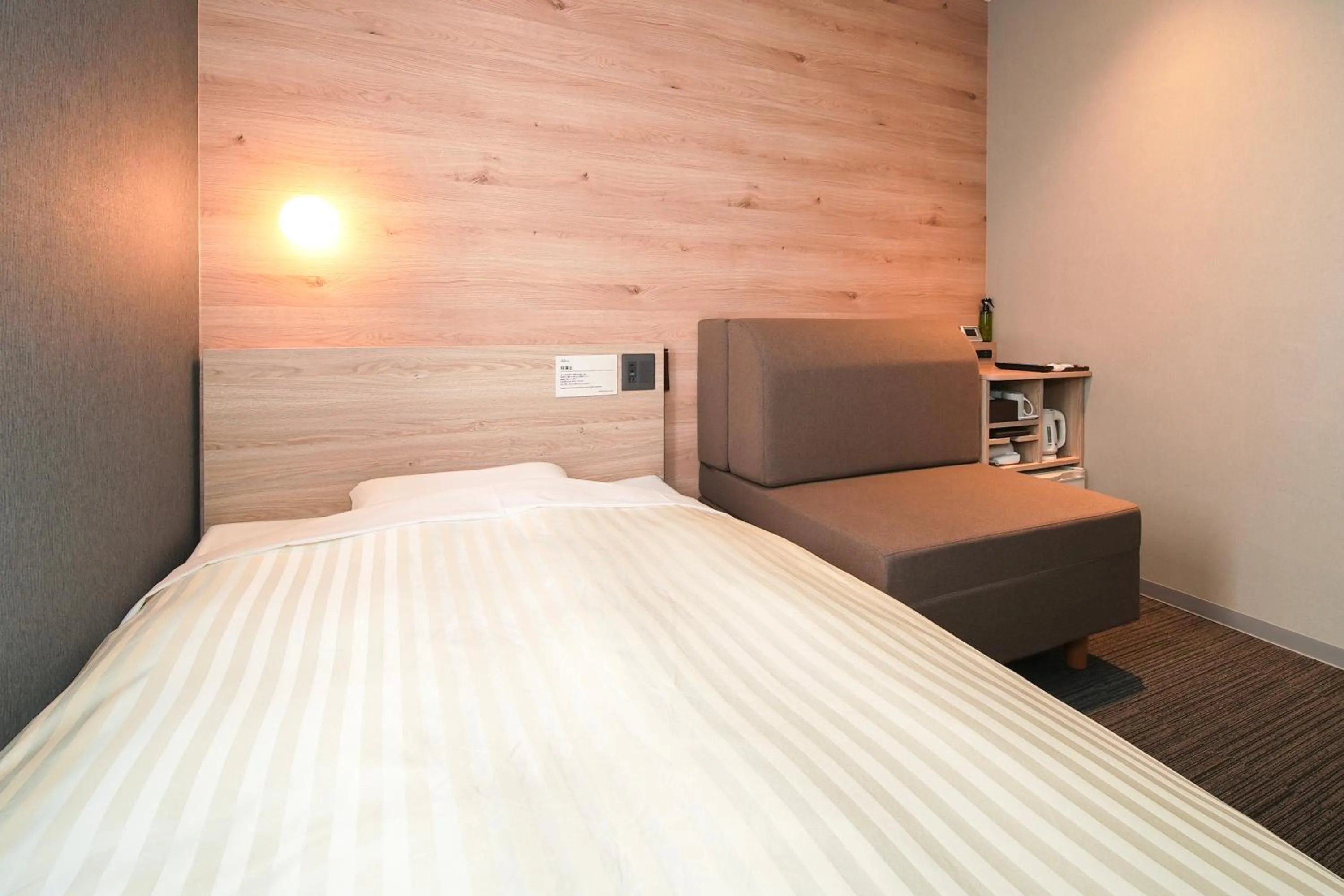 Bed in Super Hotel Utsunomiya