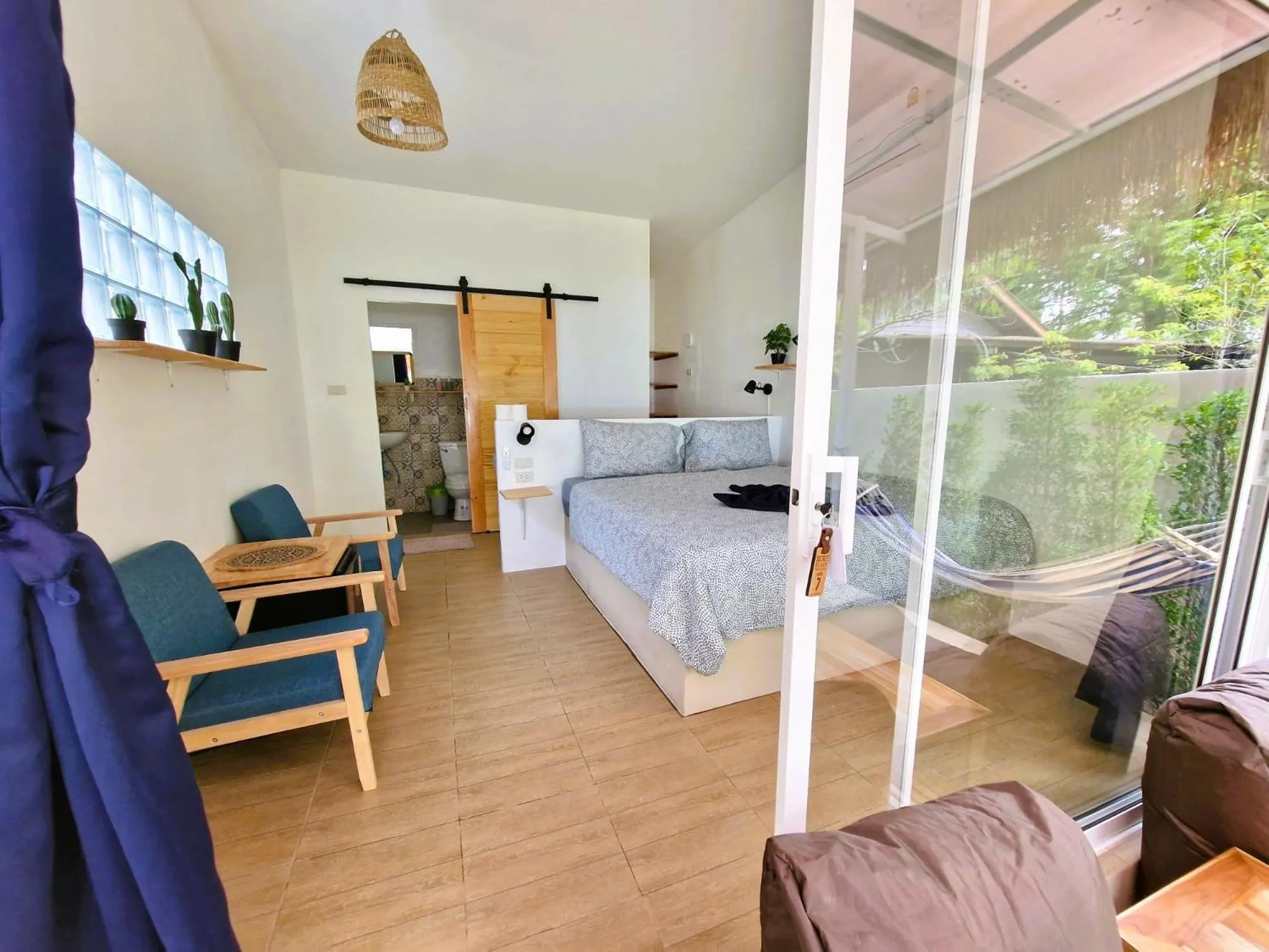 Photo of the whole room, Bed in Secret Beach Bungalows