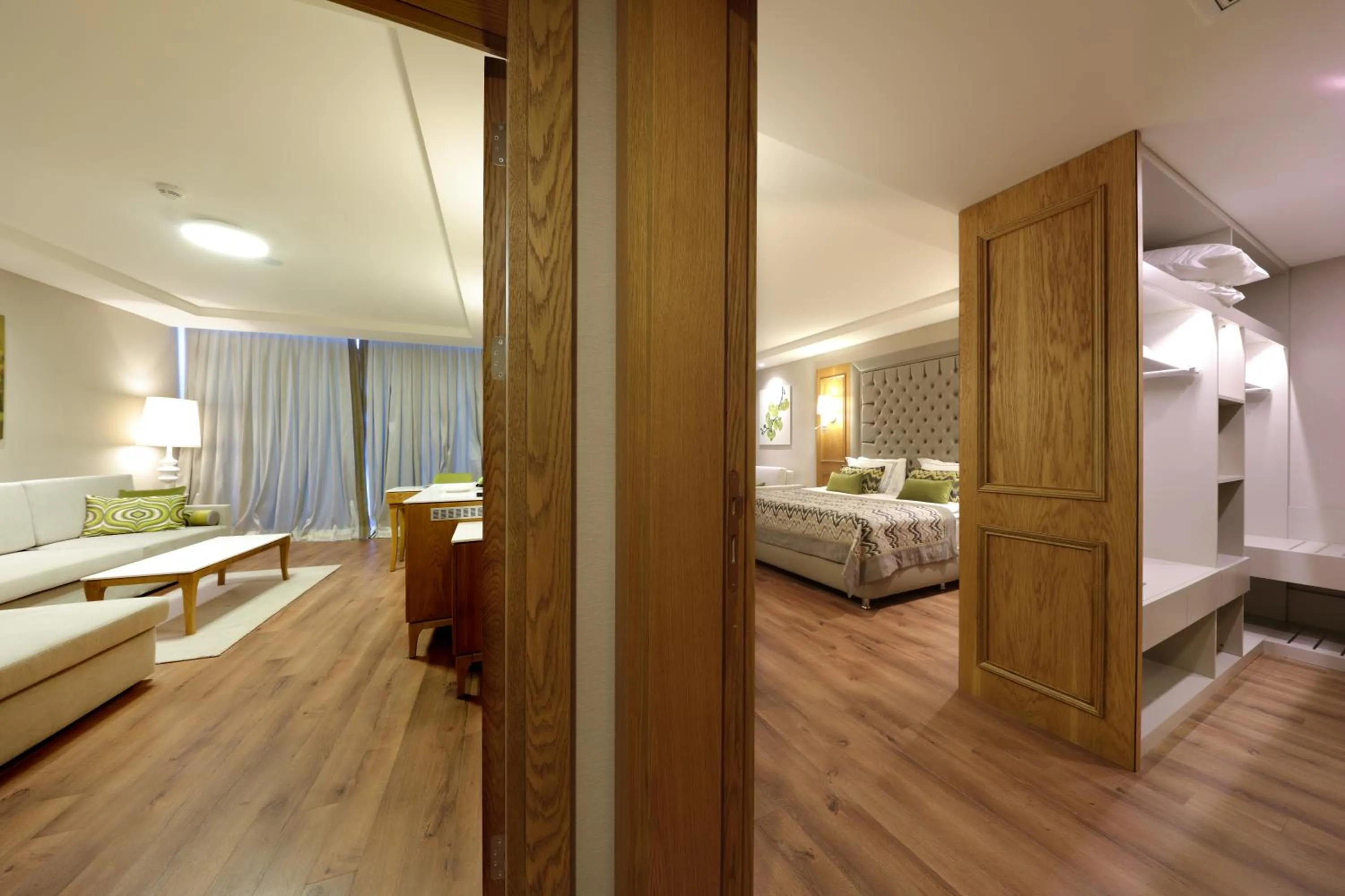 Living room, Bed in Sueno Hotels Deluxe Belek