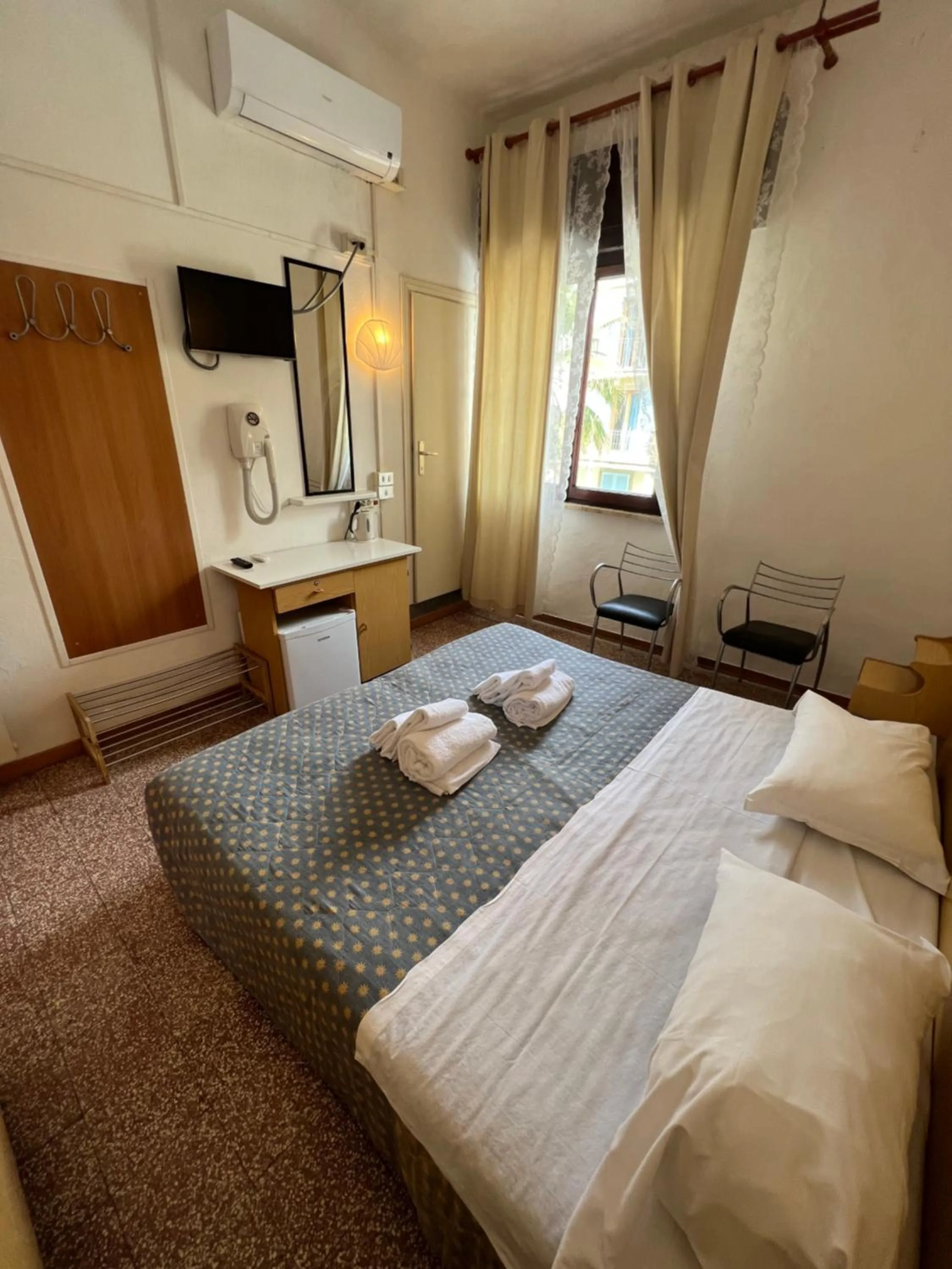 Bedroom in Hotel Aurora