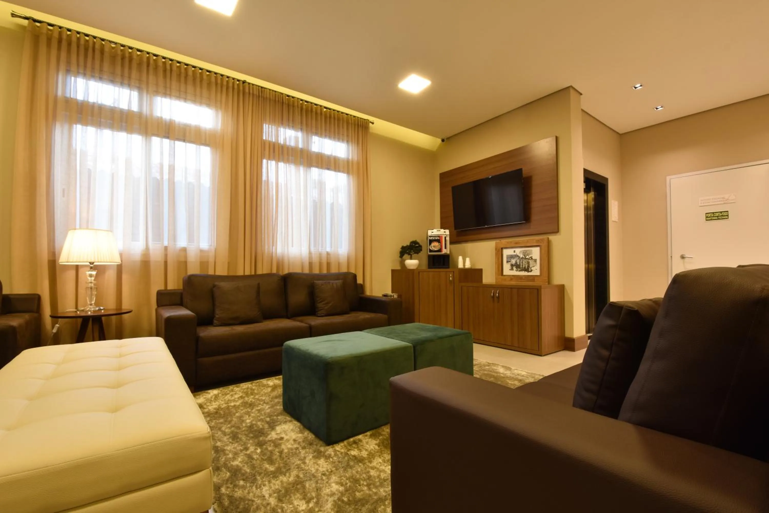 Communal lounge/ TV room in Pousada Stillo Gramado Exclusive