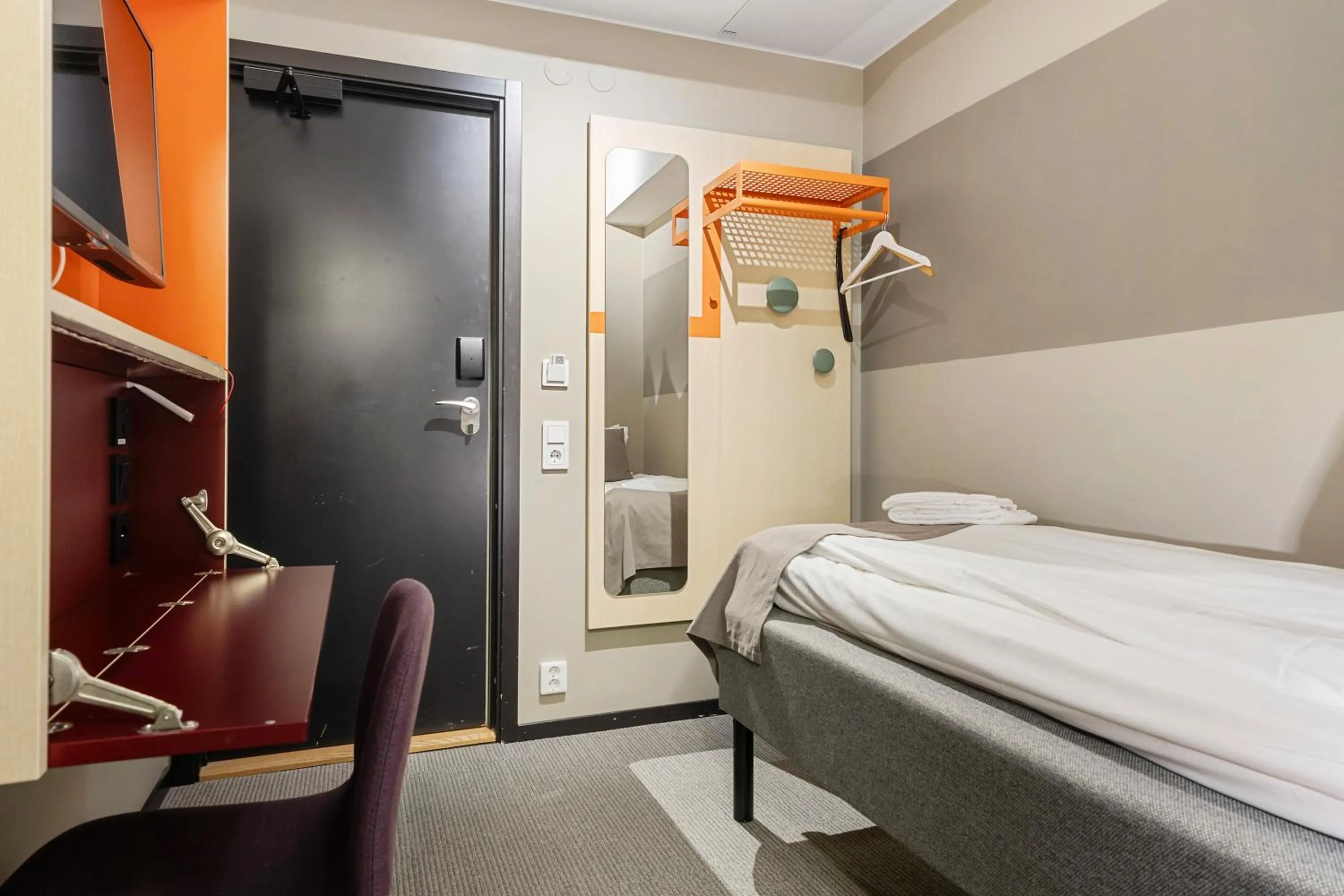 Bed in First Hotel Central