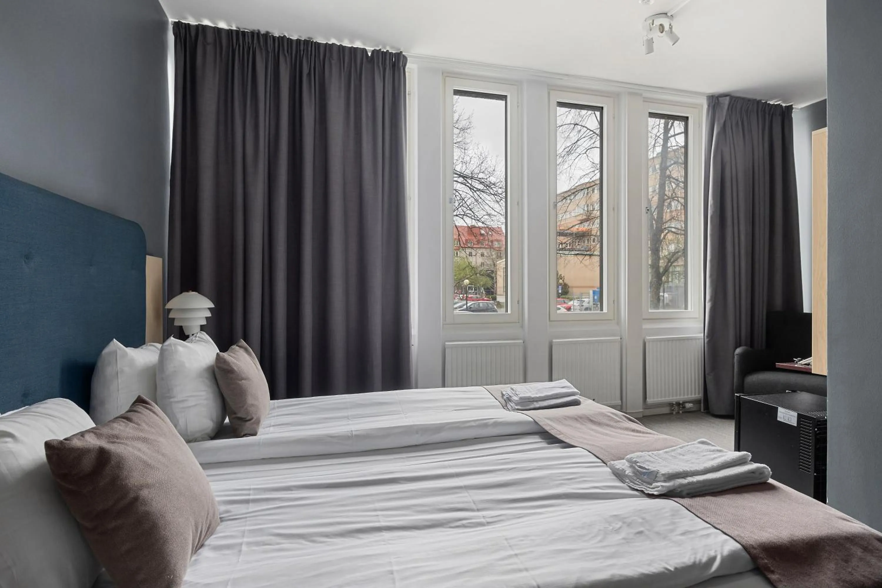 Bed in First Hotel Central