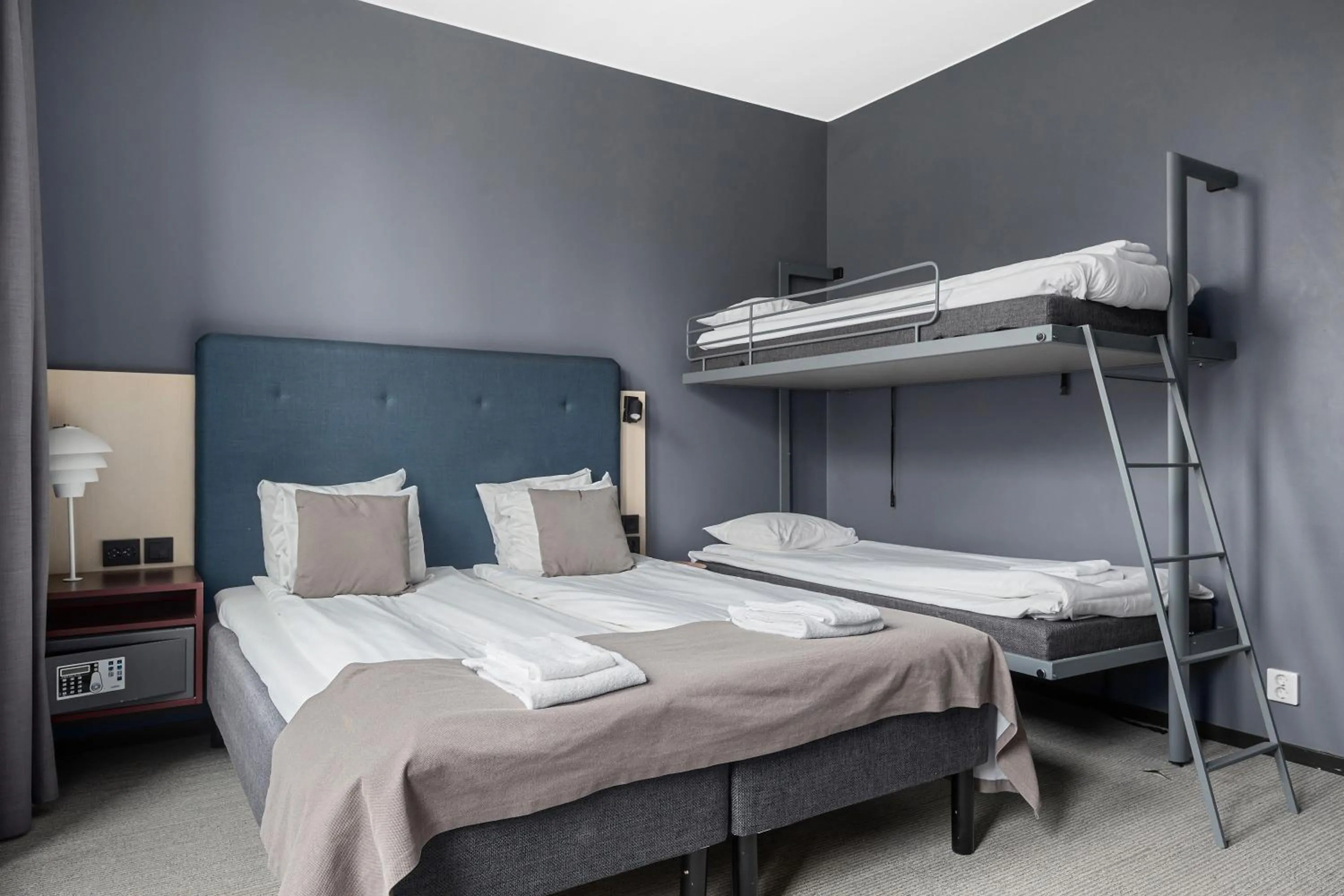 Bed in First Hotel Central