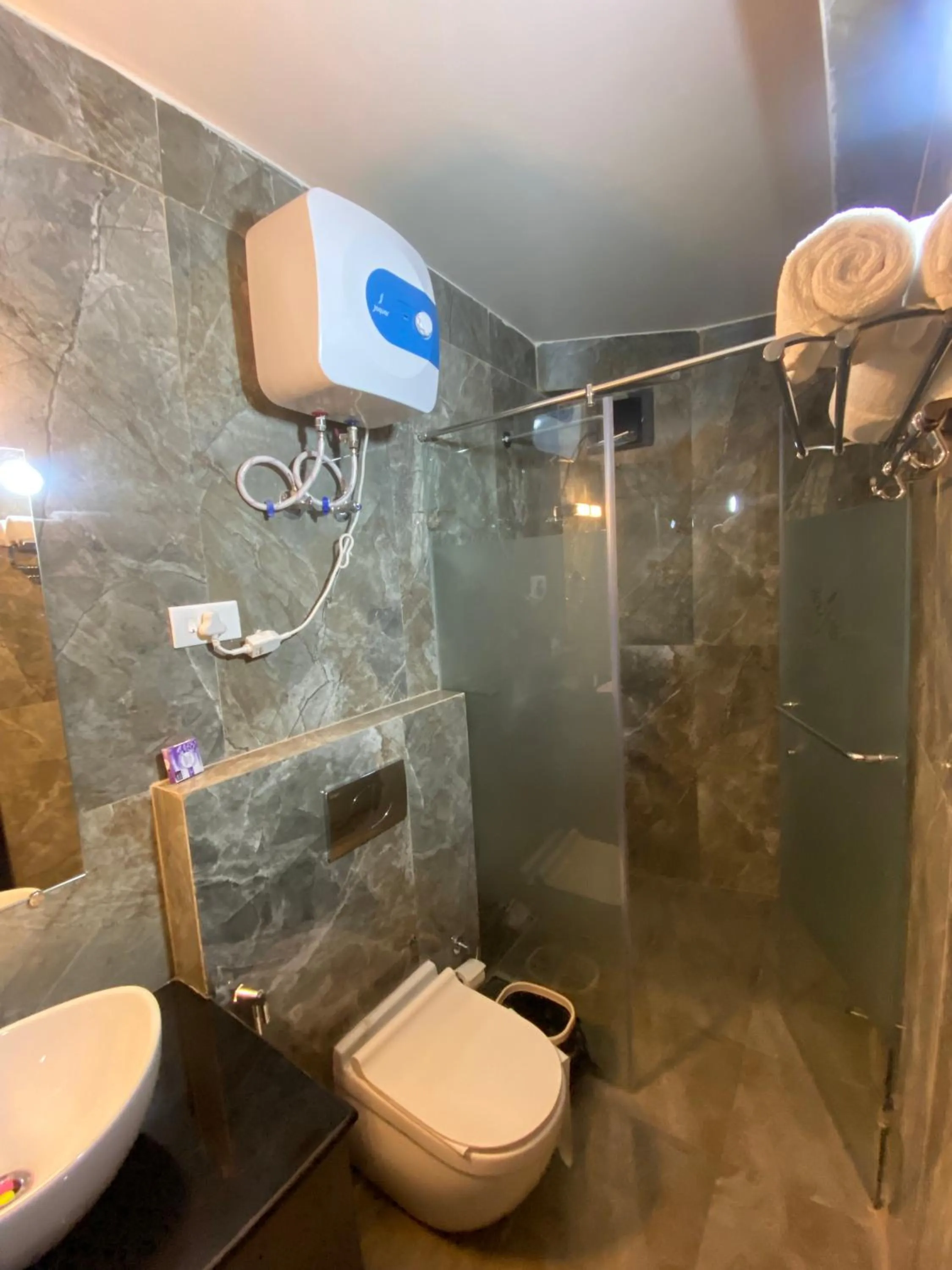 Shower in XCELSIOR HOTEL & SPA