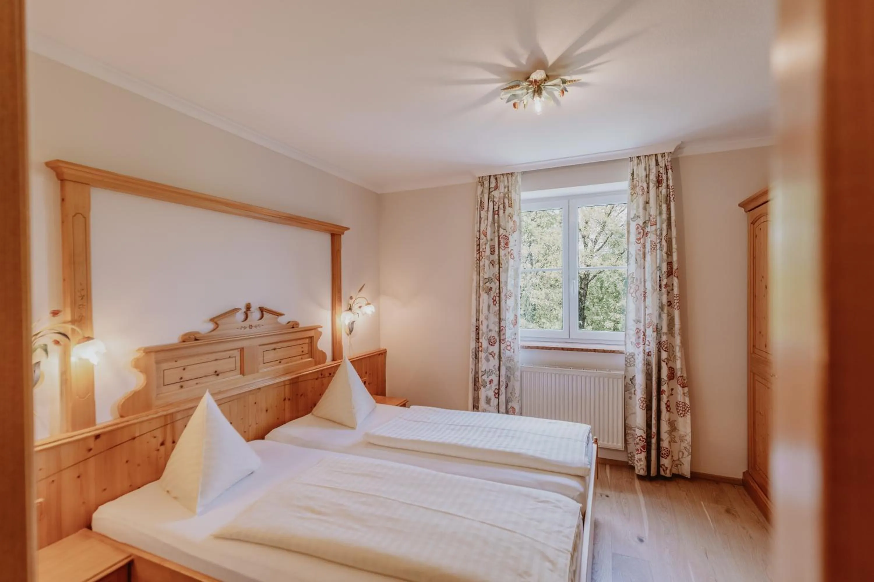 Photo of the whole room, Bed in Landhotel Gschirnwirt