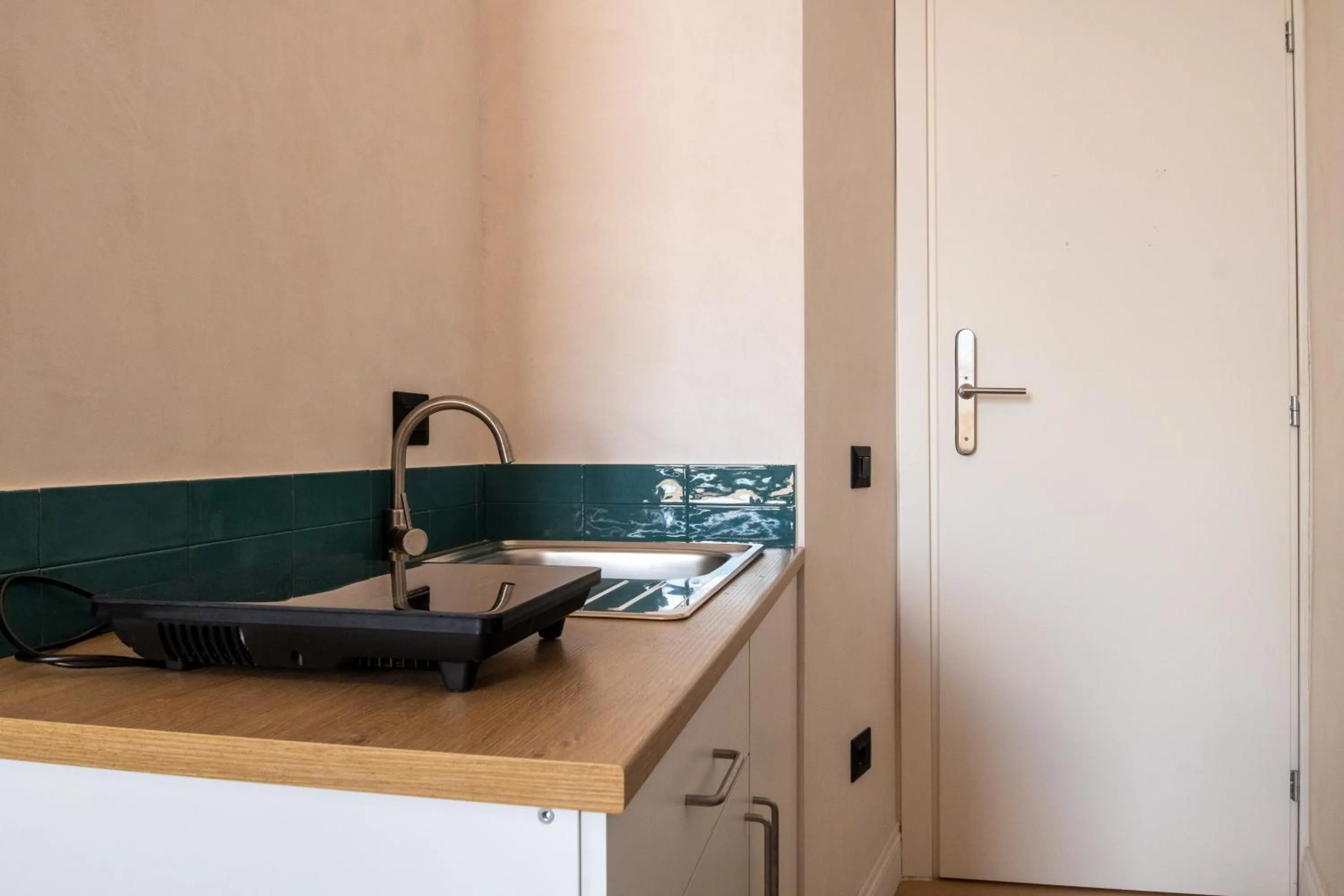 Kitchen or kitchenette in Cunabu Apartments