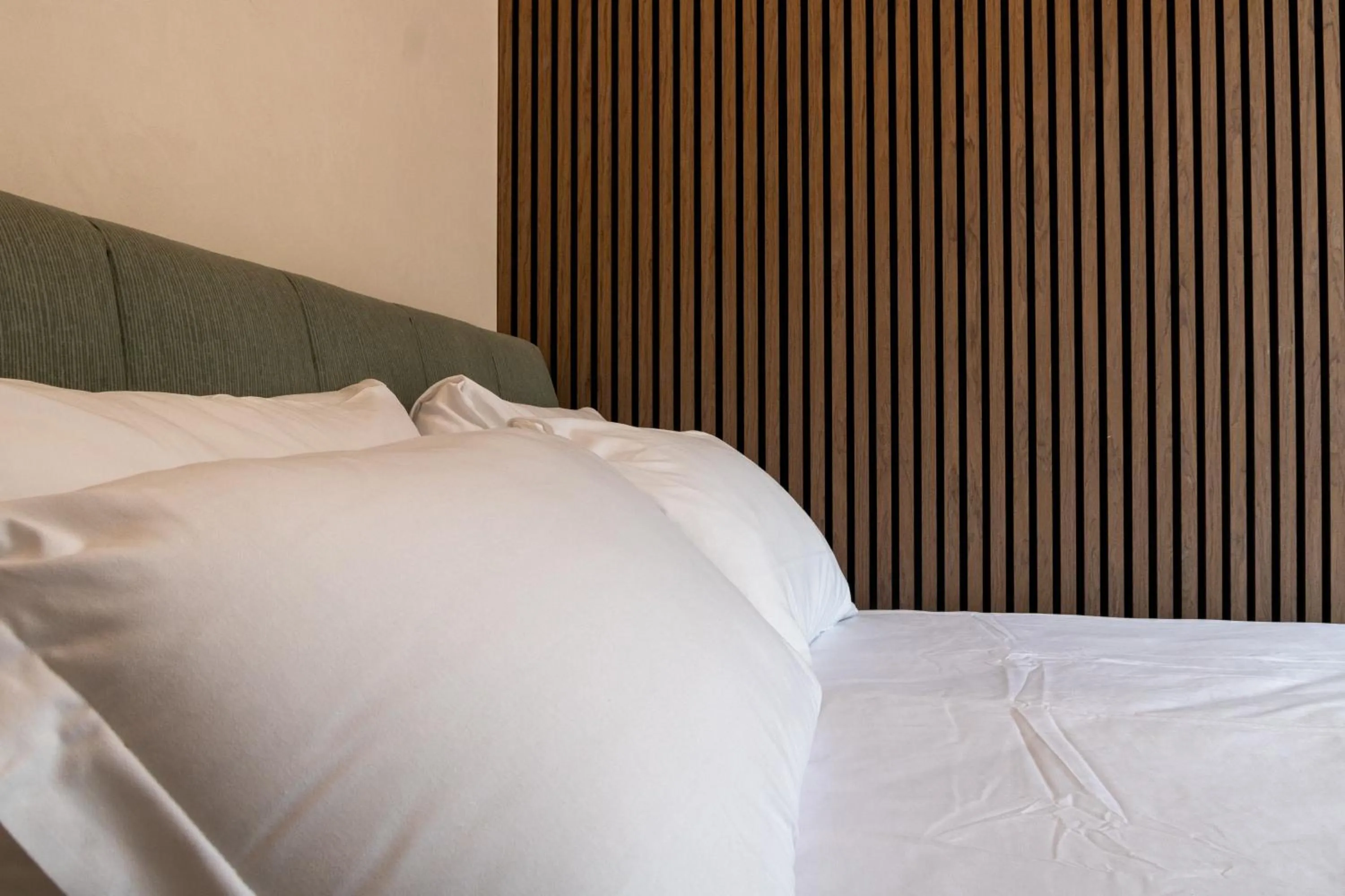 Bed in Cunabu Apartments