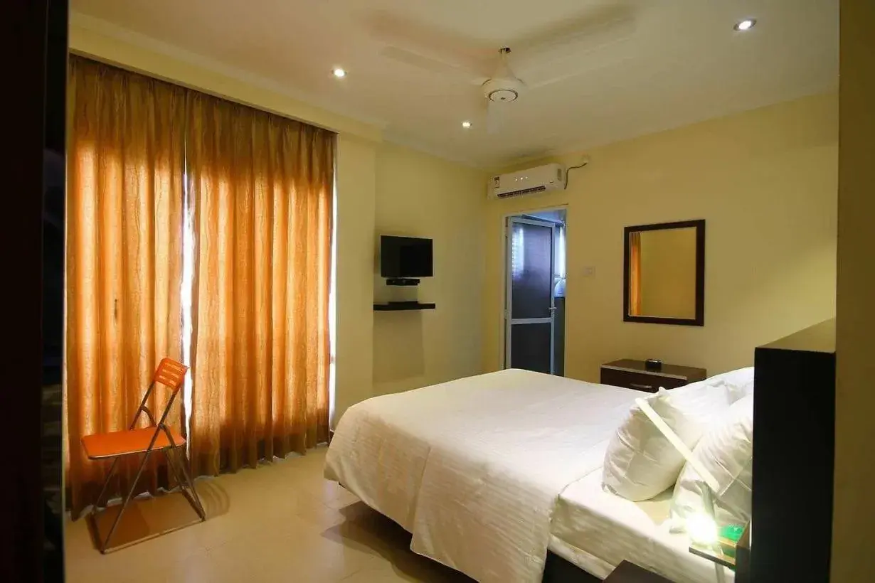 Deluxe Double Room (2 Adults + 1 Child) - single occupancy in Splendid Holiday Guest House Deluxe Double Room (2 Adults + 1 Child) - single occupancy in Splendid Holiday Guest House