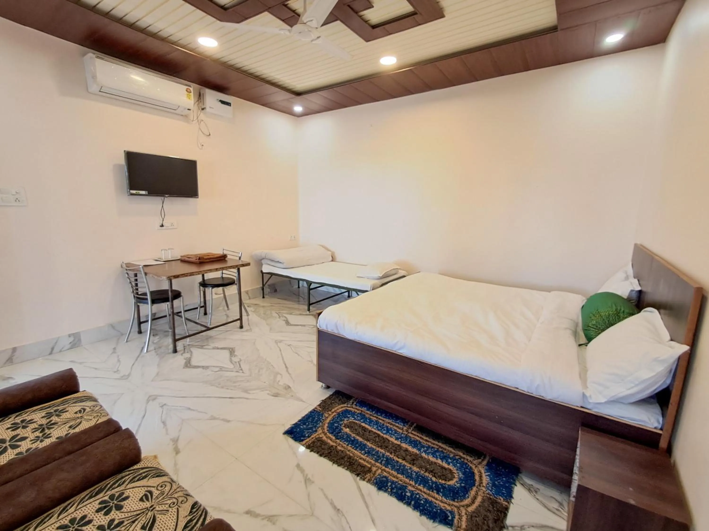 Bed in LD Guest House, Ayodhya