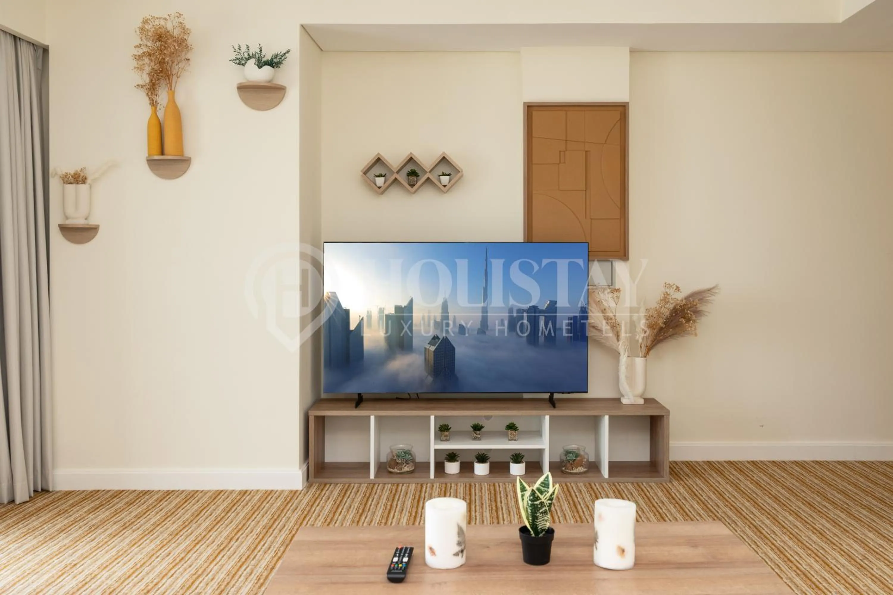 TV and multimedia in Holistay Luxury Homes - Burj khalifa view - Direct Access Dubai Mall