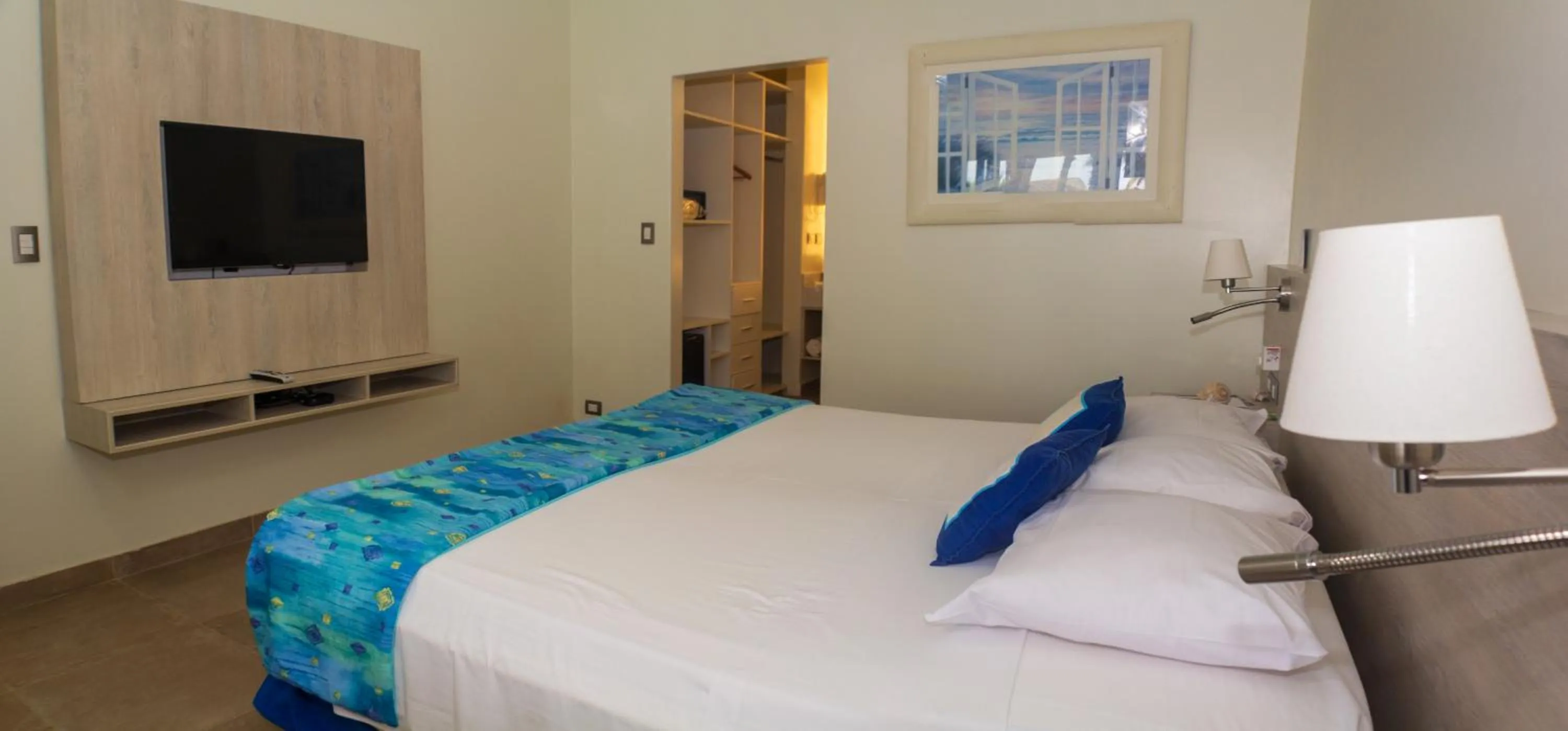 Photo of the whole room, Bed in Punta Sal Suites & Bungalows Resort