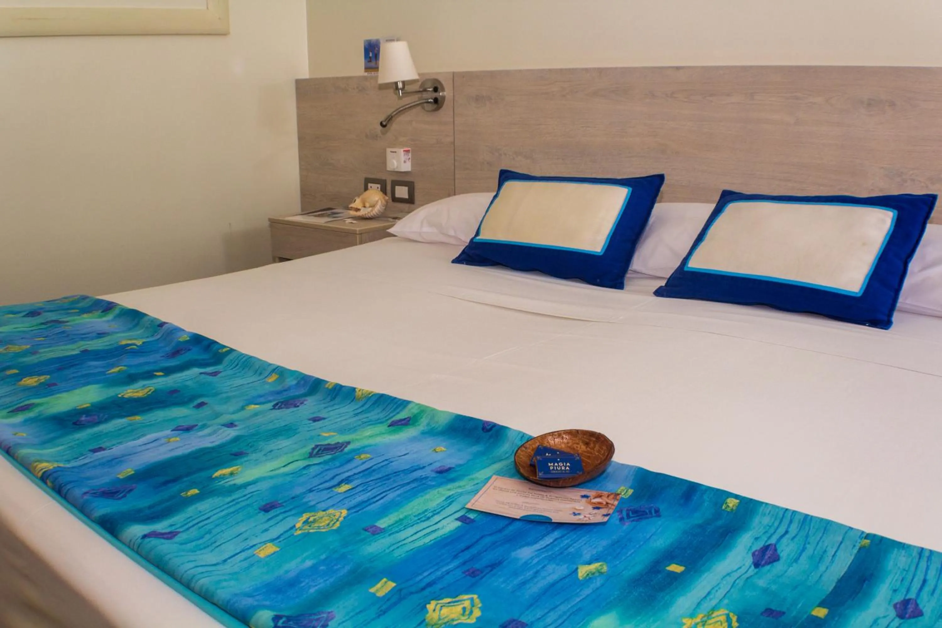 Bed in Punta Sal Suites & Bungalows Resort